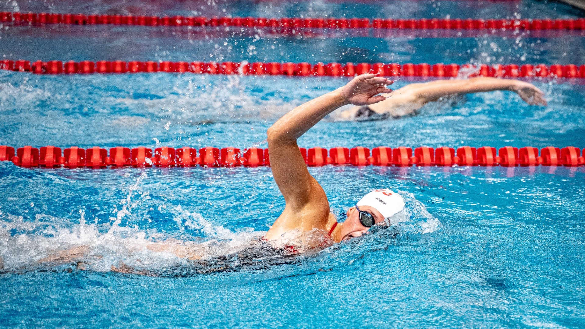 Dawsyn Green swimming 50 free leg of 200 medley relay