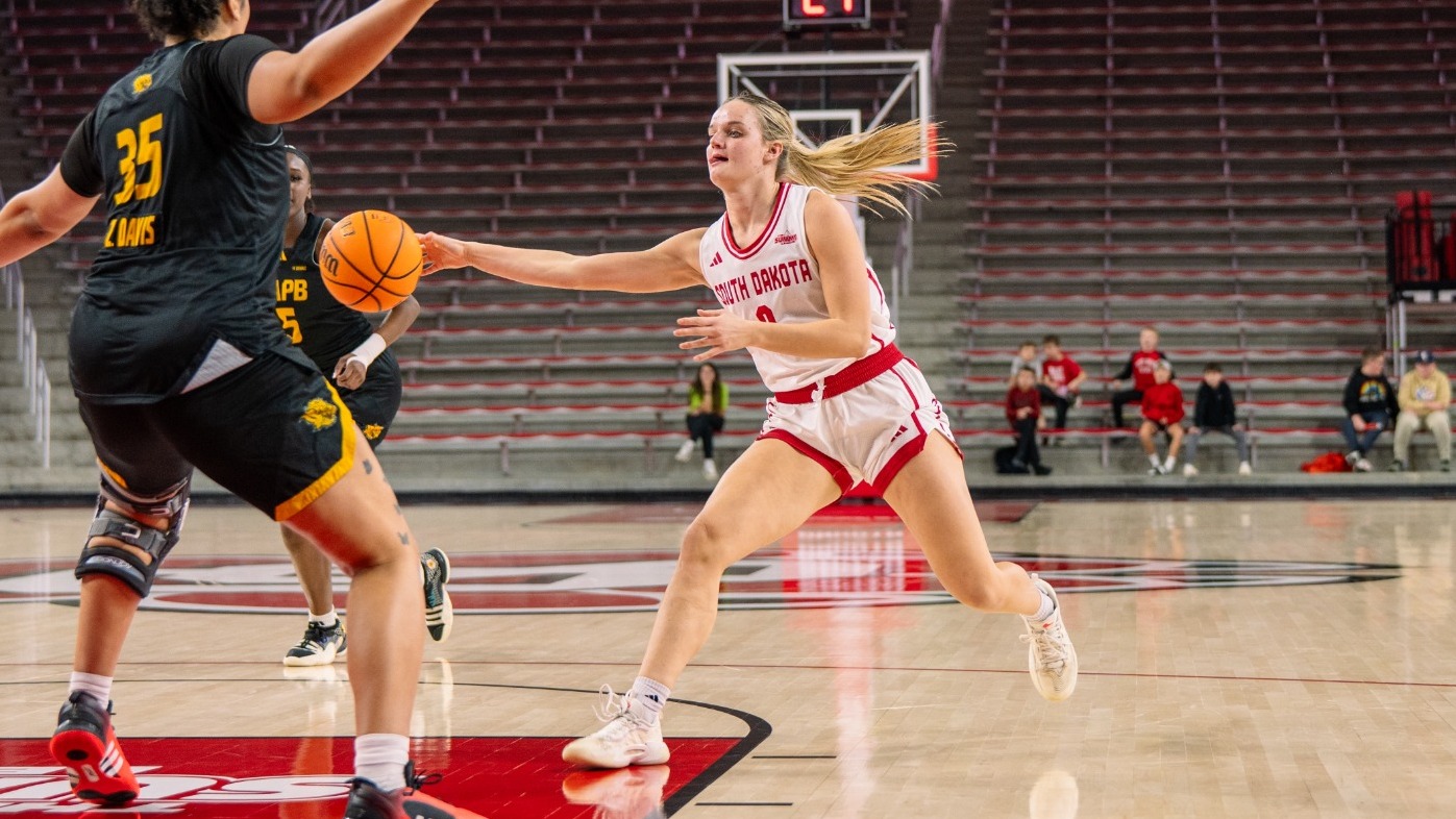 Olivia Kieffer passes the ball in the lane against UAPB in the SCSC