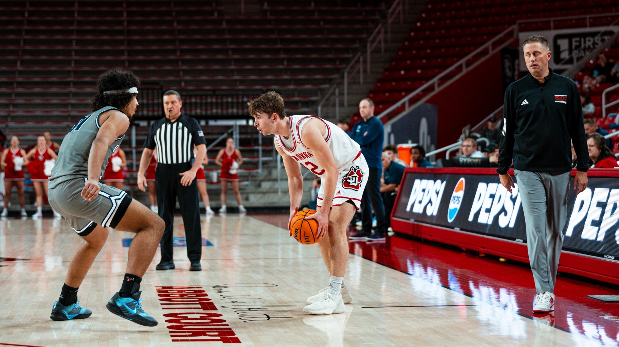 Isaac Bruns with the ball on the wing against Dakota State 2025