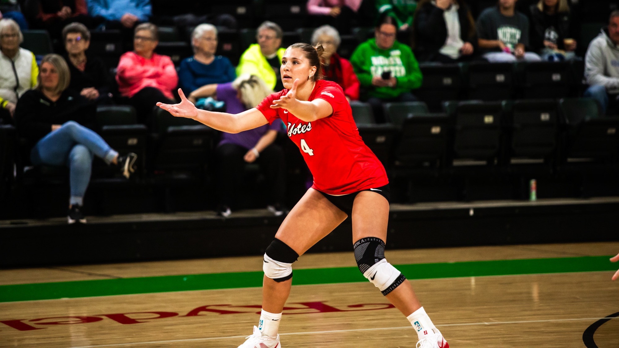 Lauren Medeck waiting for a serve at North Dakota 2026