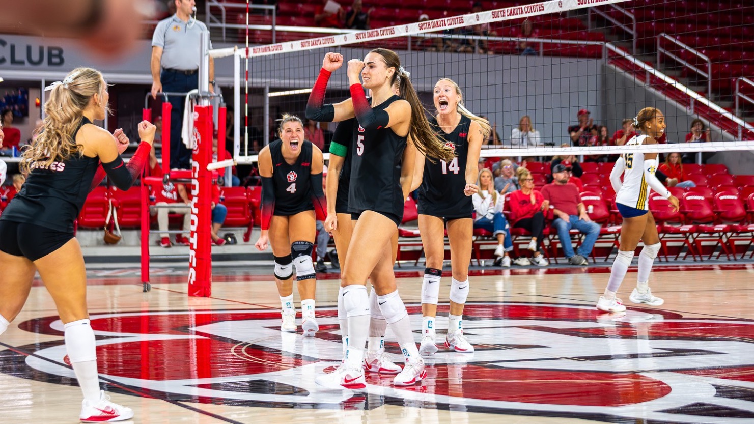 Audrey Nelson celebrating a point against KC