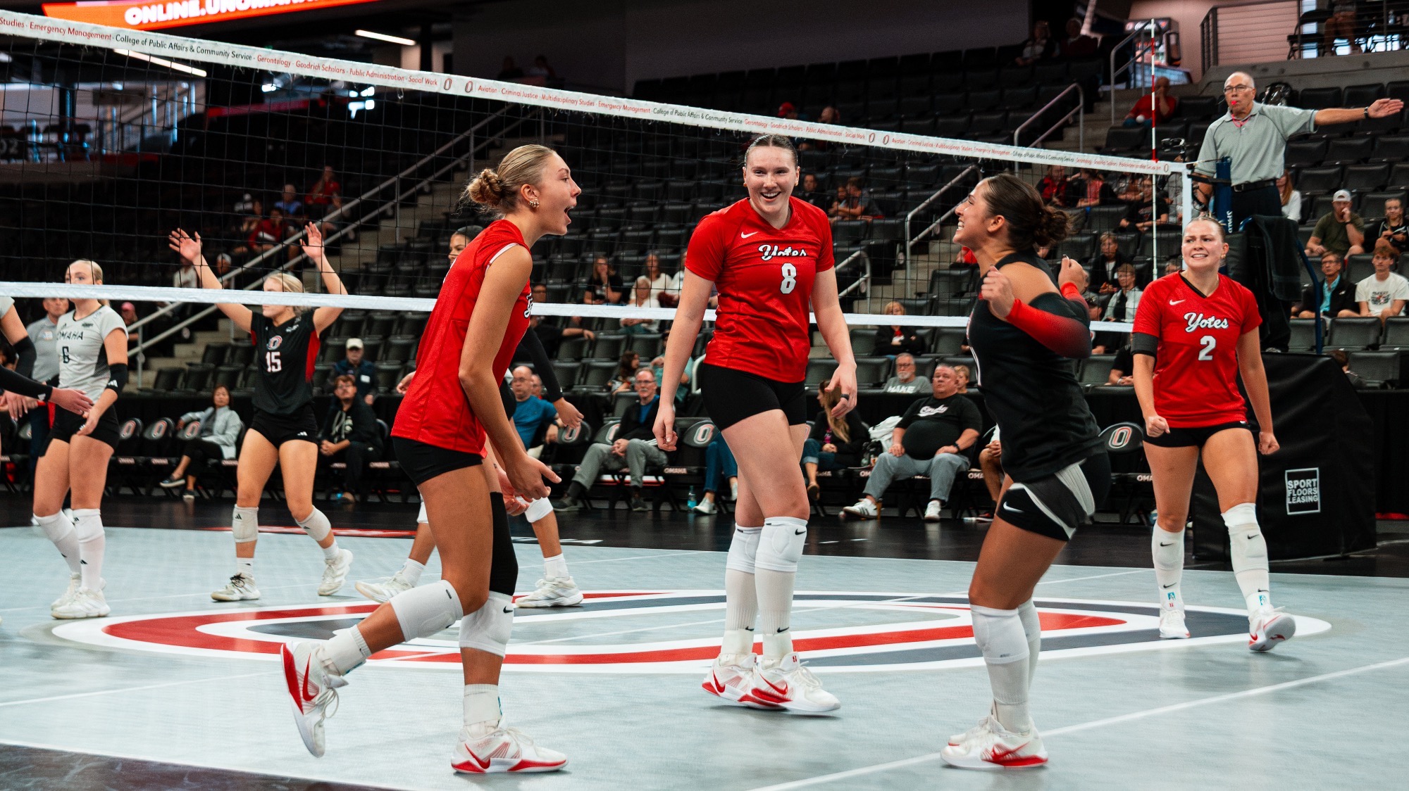 Gabi Zachariasen and Sierra Pokharel celebrating a point against Omaha 2026