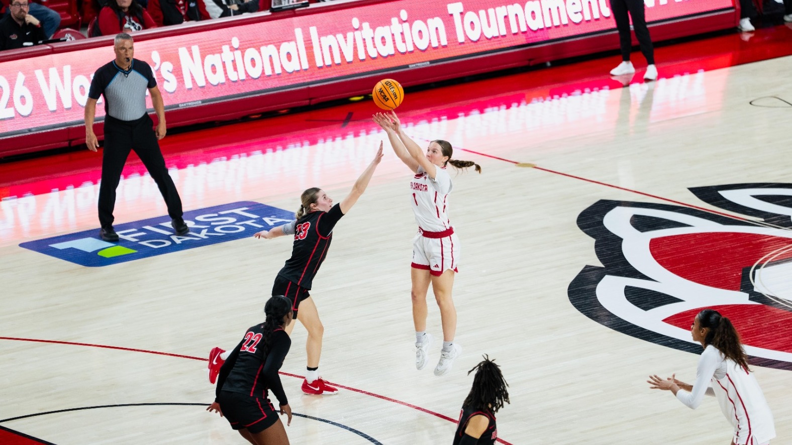 Molly Joyce puts up a three-point shot during a WNIT game in the SCSC