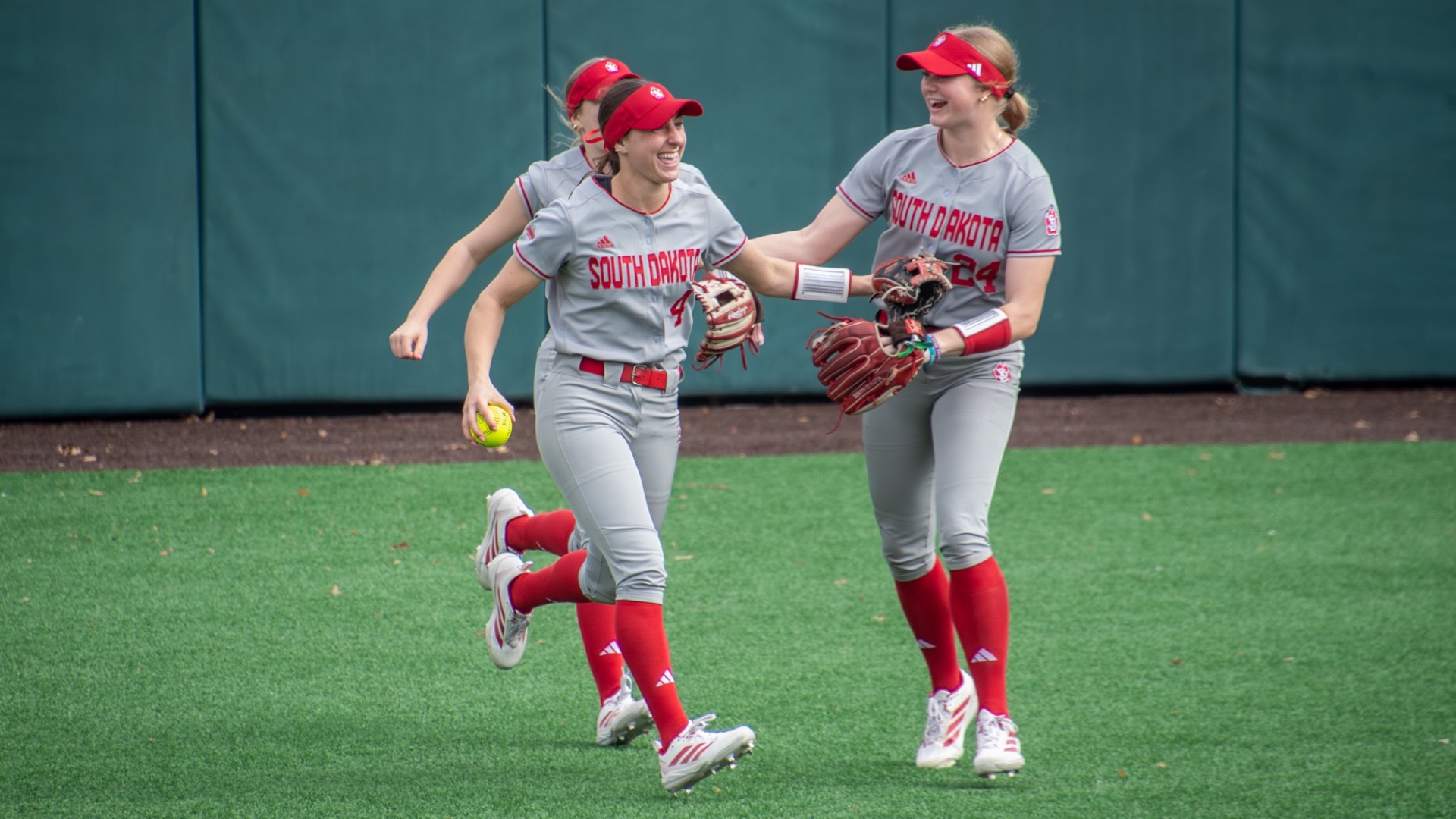 Autumn Iversen running in after a catch in the outfield