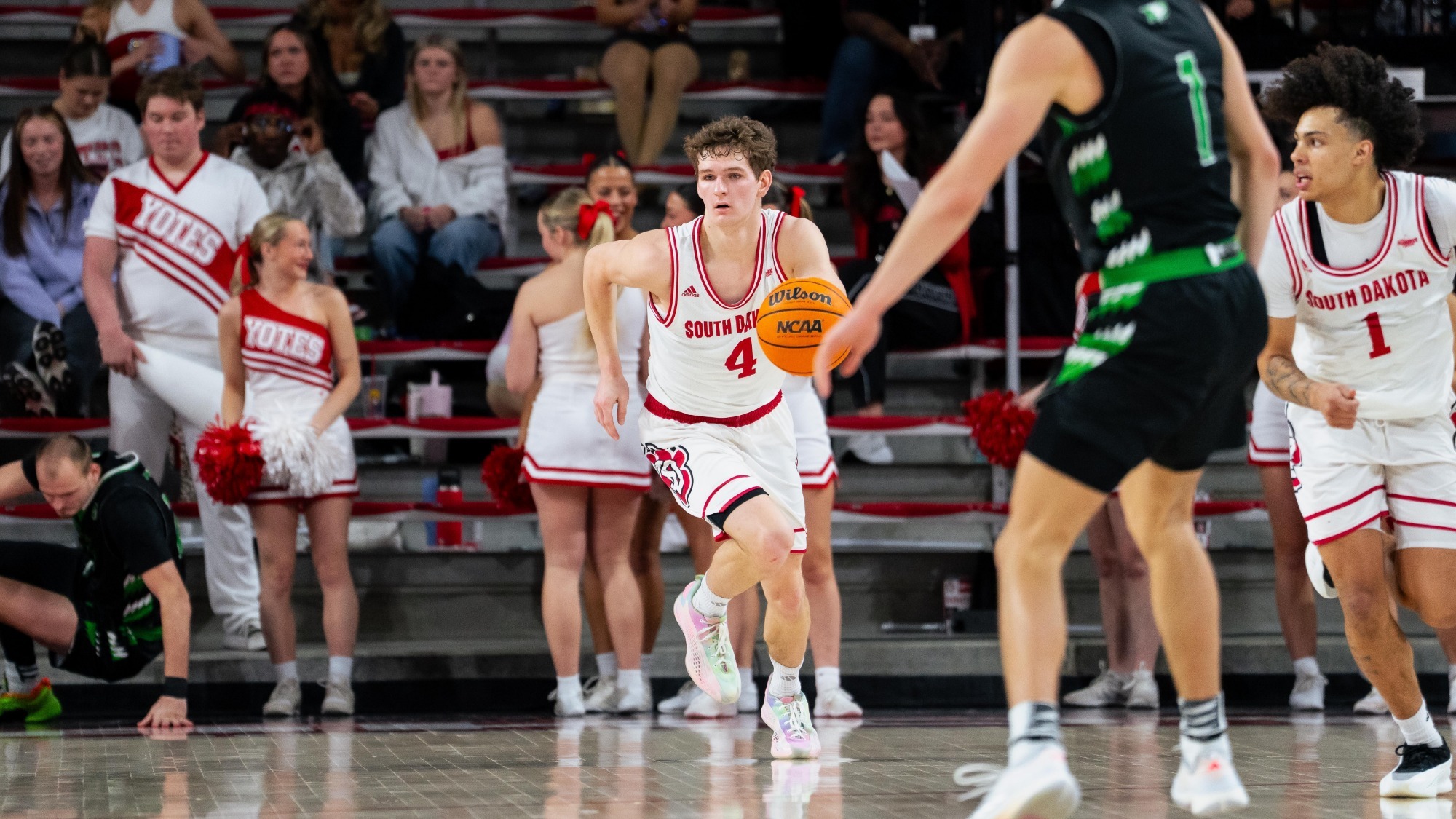 Vince Buzelis bringing the ball up the floor against North Dakota 021126