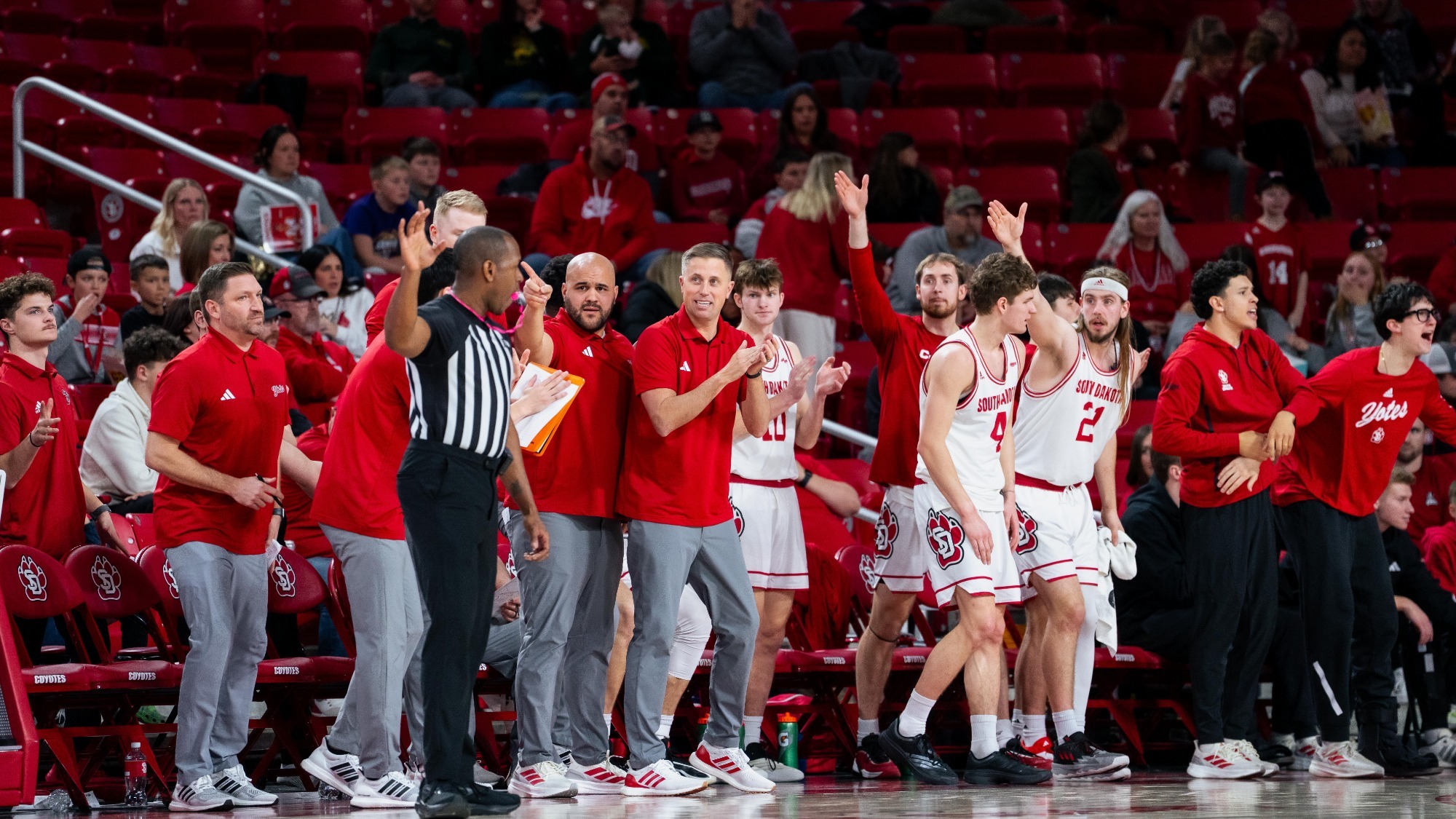 The South Dakota bench celebrating after a bucket against NDSU 2025-26