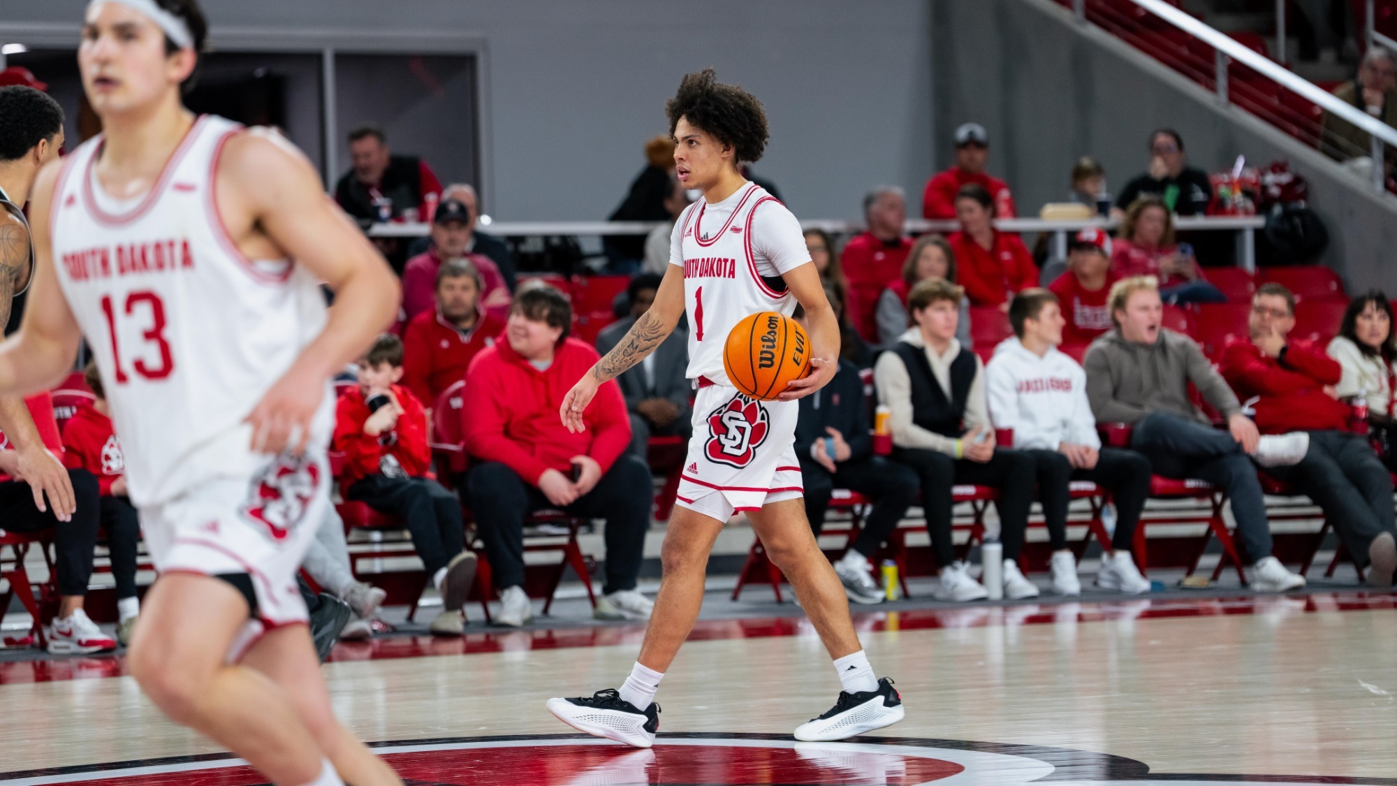 Uzziah Buntyn walking the ball up the court against North Dakota 2025-26