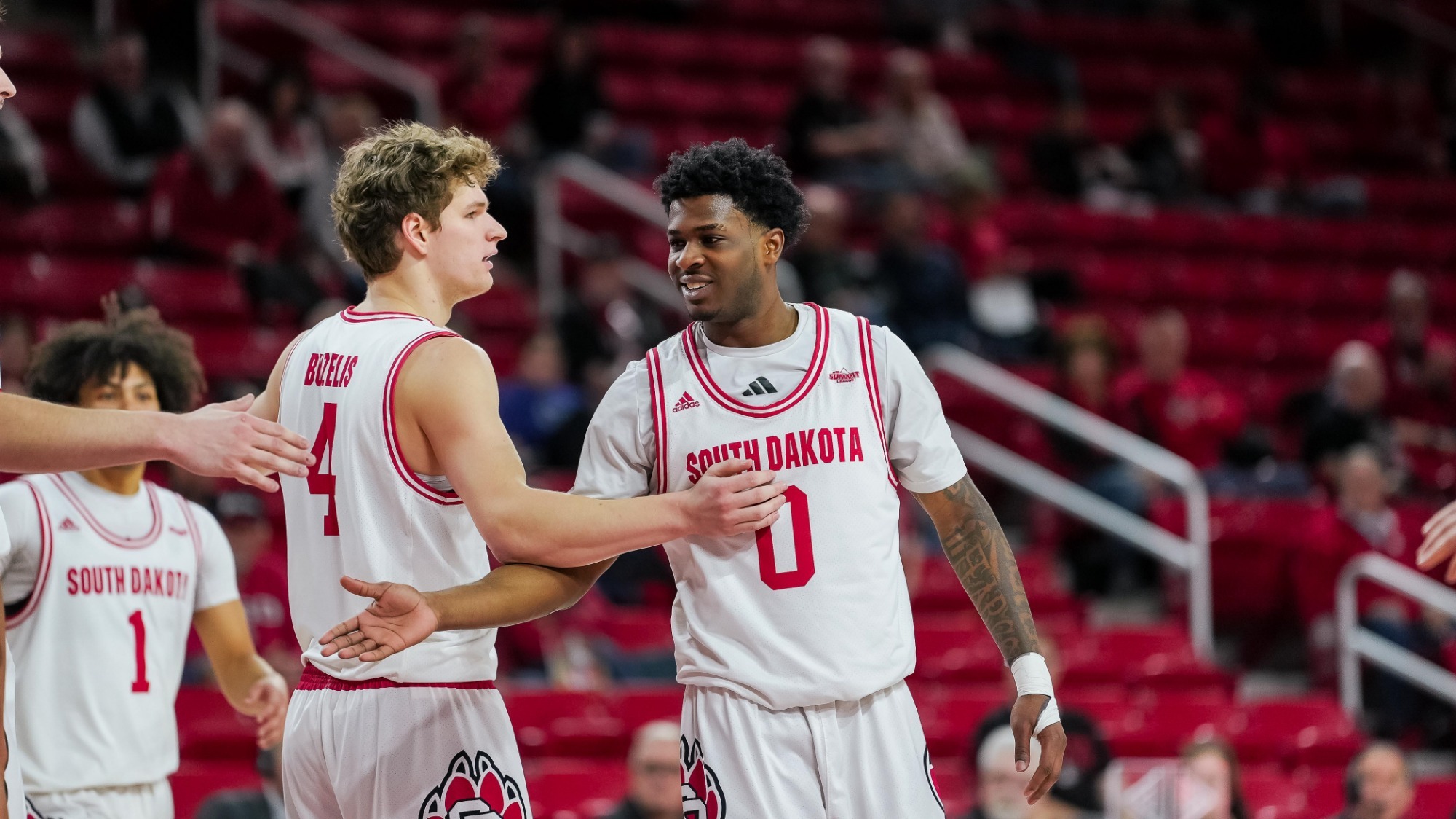 Jordan Crawford and Vince Buzelis during a men's basketball game against Omaha 022526