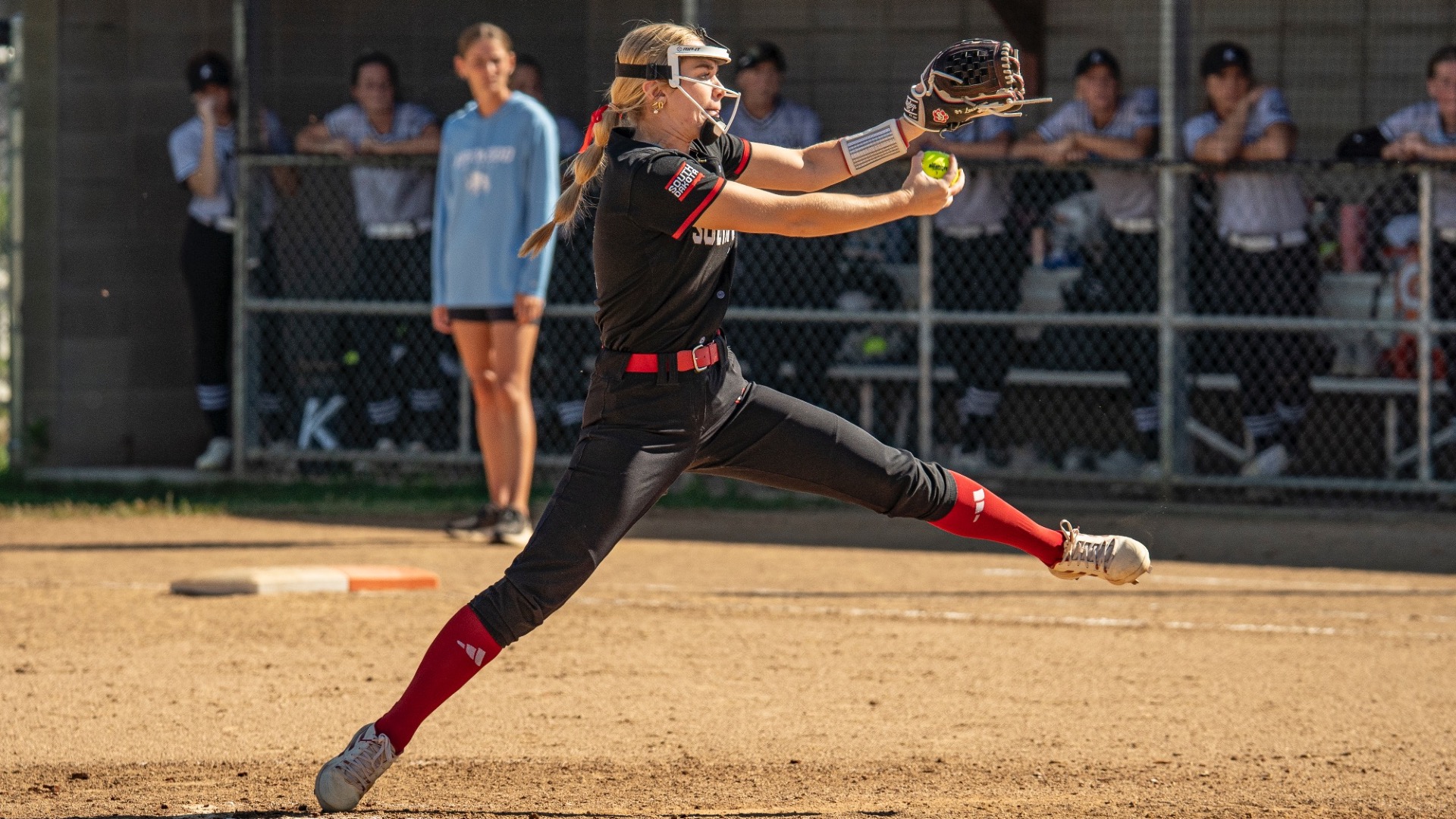 Aubrey Lensmeyer pitching at home