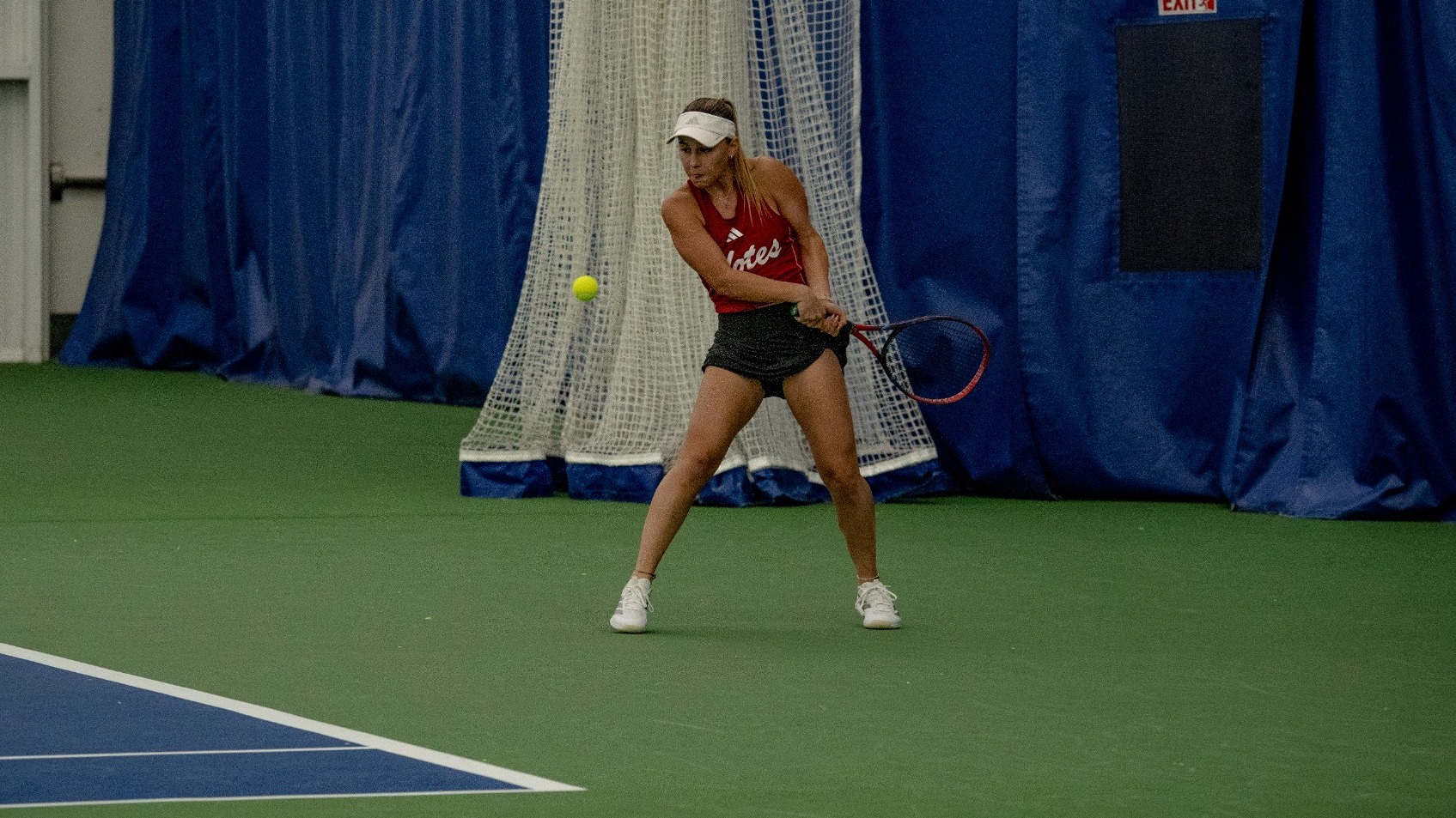 Natalia Alves De Lima returns a serve.