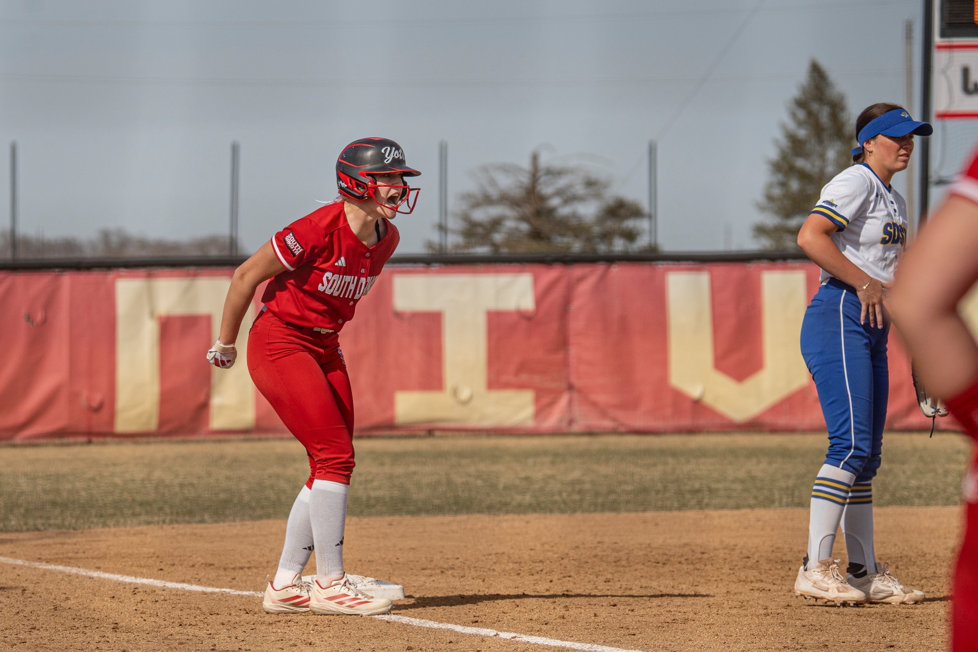 Ella McGee on third base