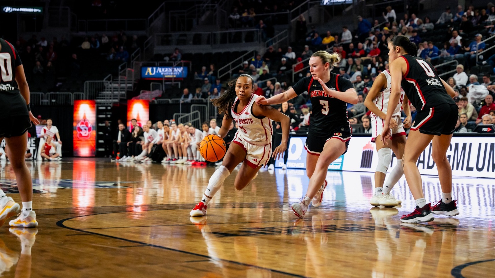Angelina Robles drives to the basket against Denver at the Summit League Tournament