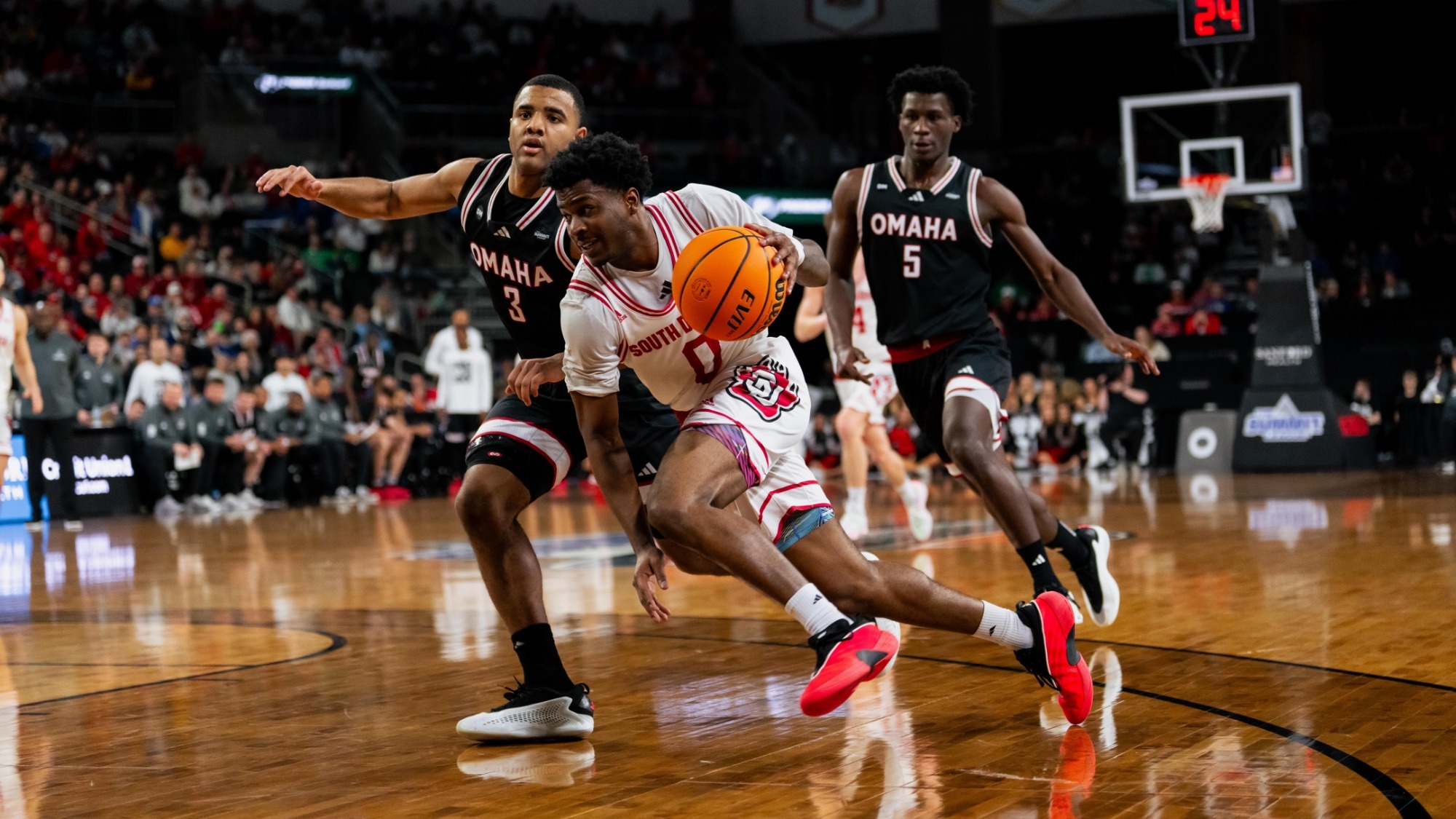 Jordan Crawford driving against Omaha at the Summit League Tournament