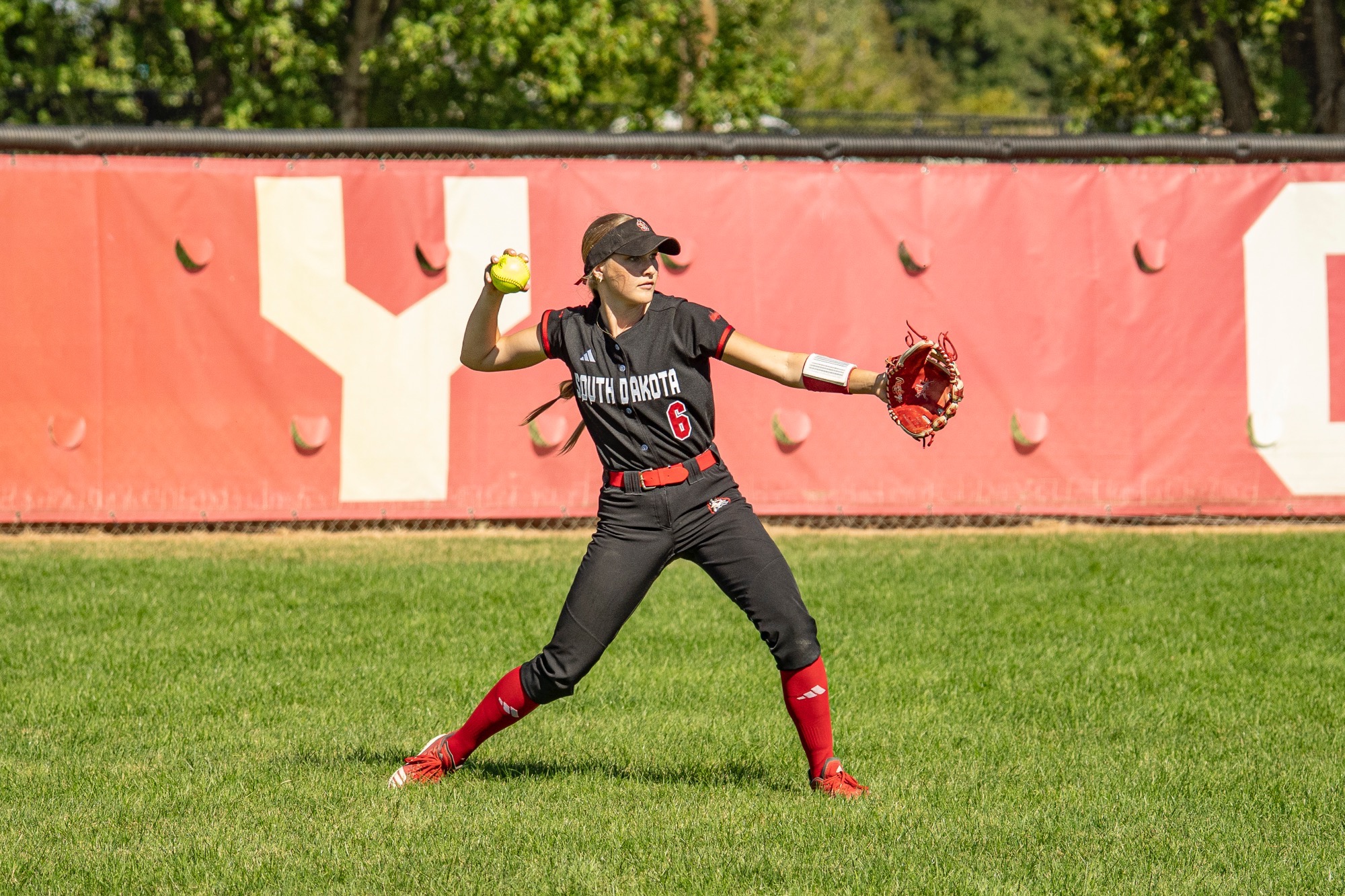 Ella McGee throwing in from left