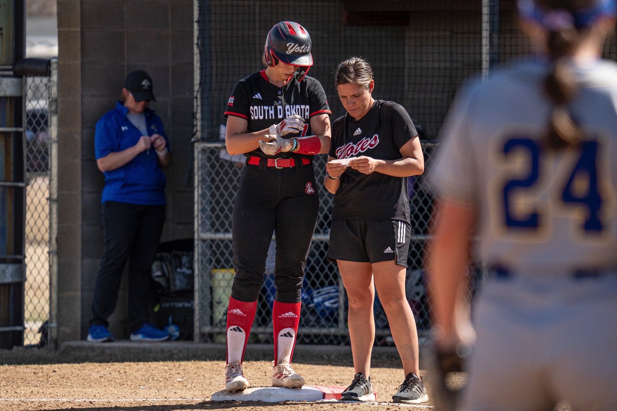 Abi Brown and Piv at first base