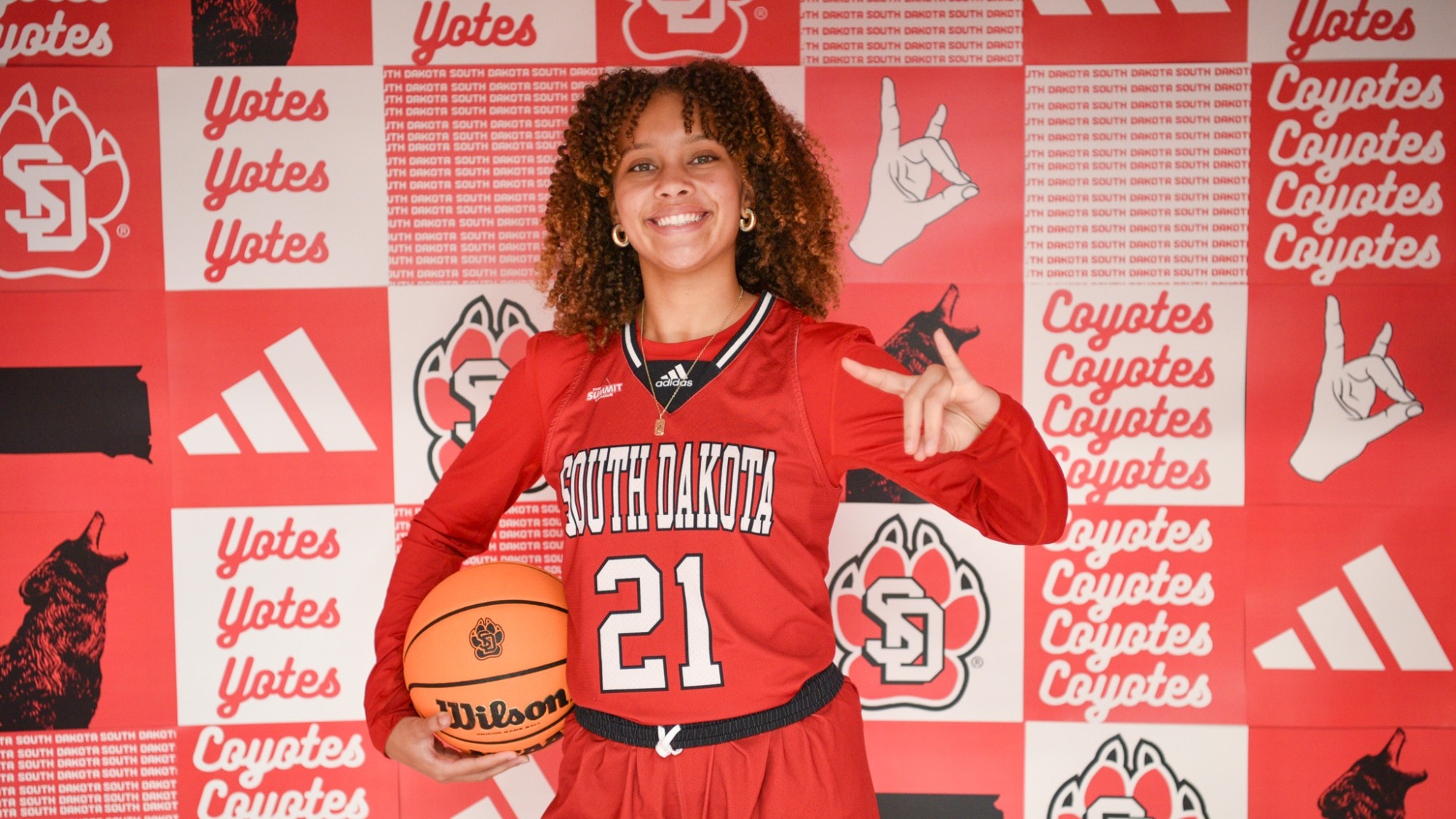 Gabby Jackson poses for a photo in a South Dakota uniform