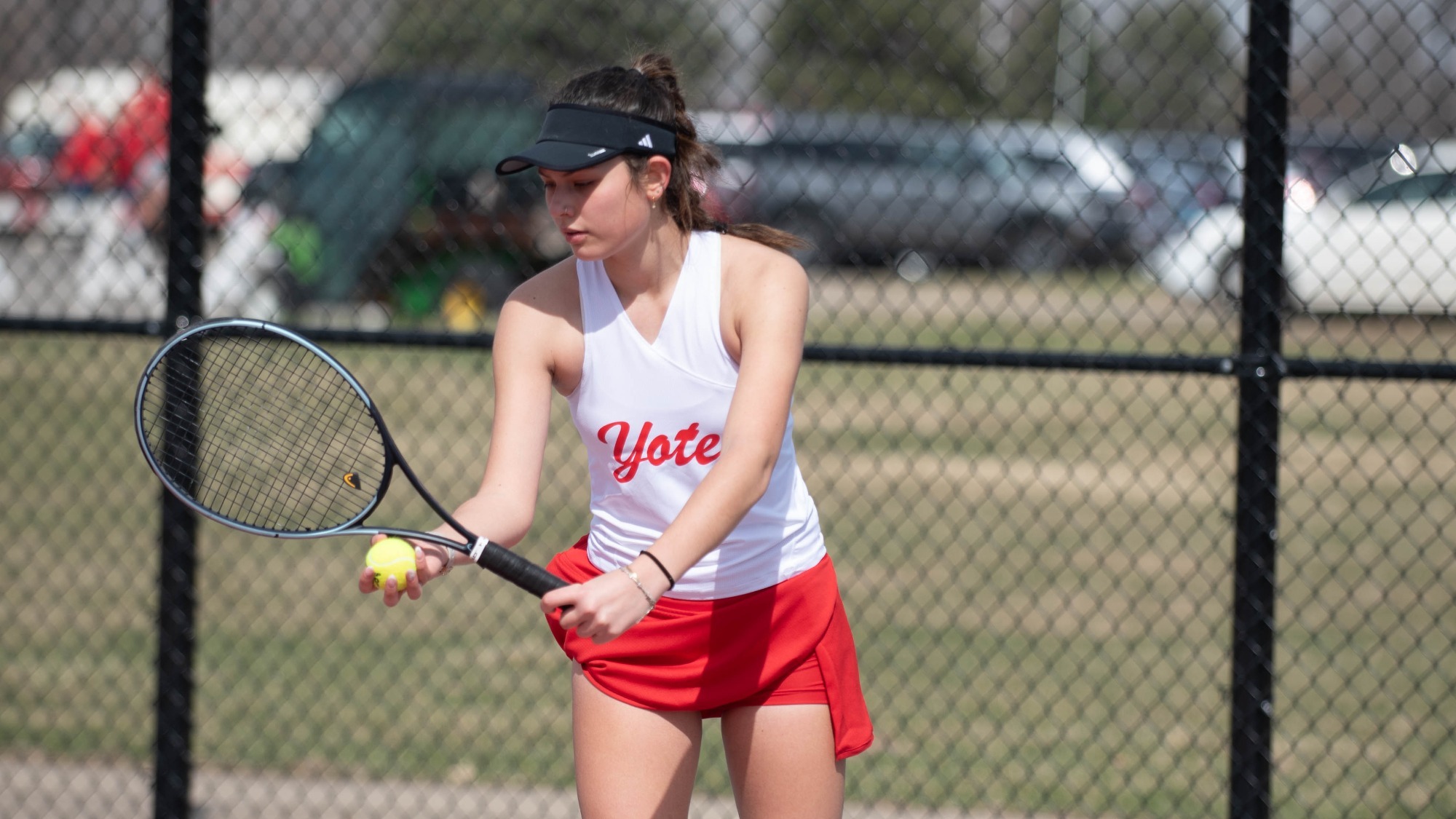 Cassy Marra preps her serve against Kansas City