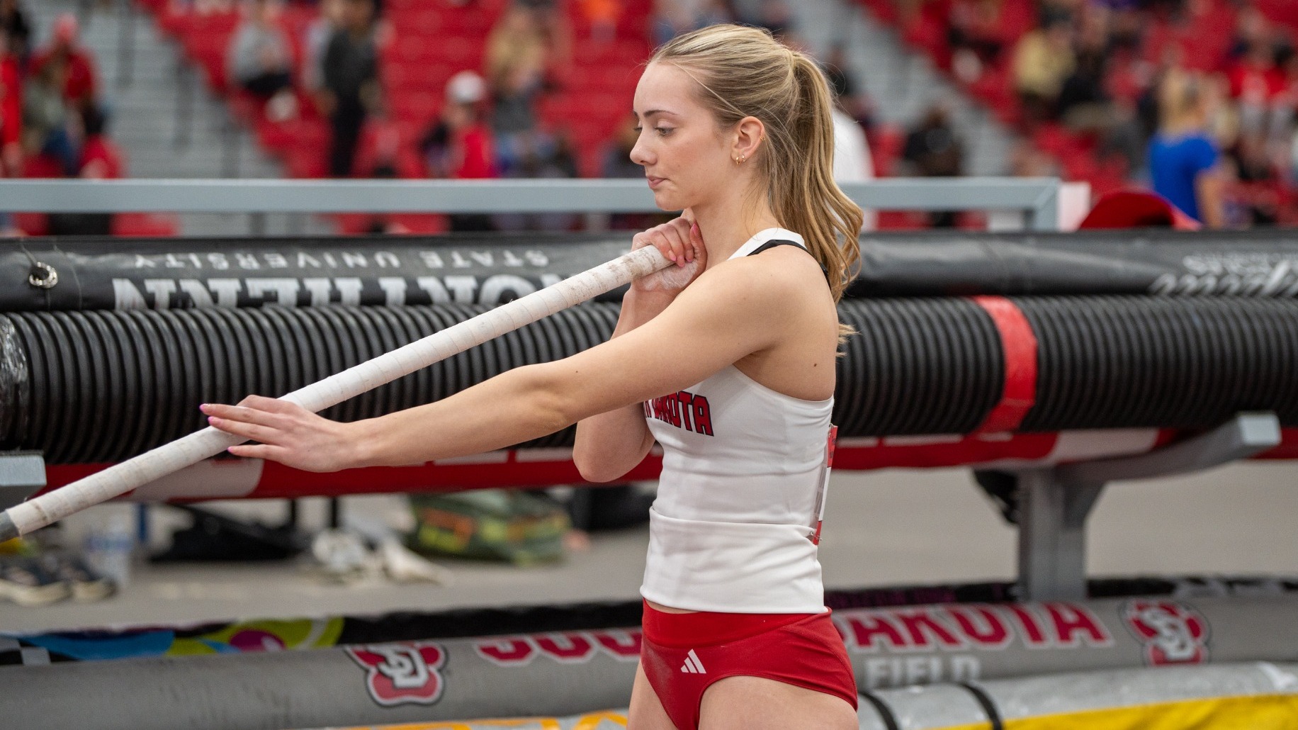 Anna Willis prepares for a pole vault attempt