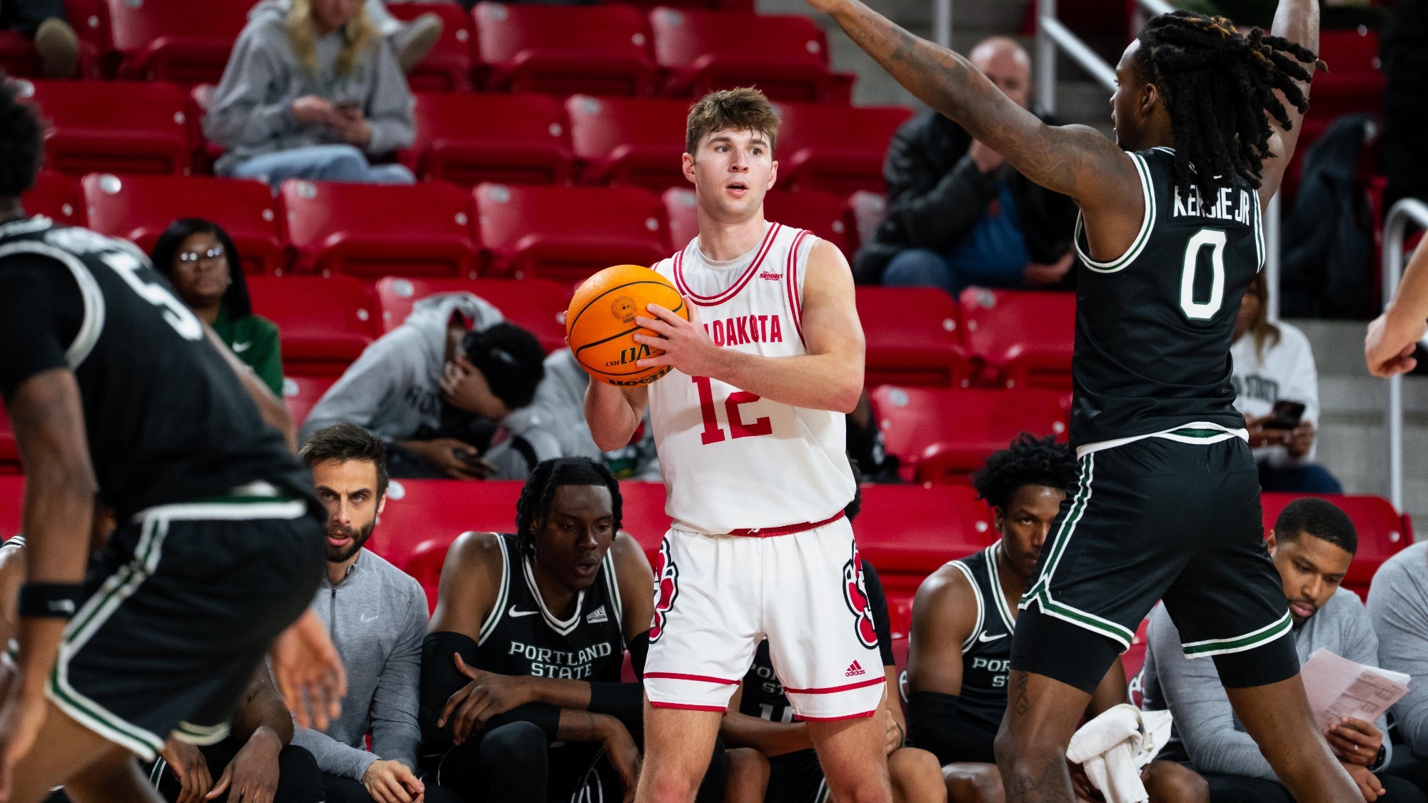 Isaac Bruns holding the ball on the wing vs Portland State