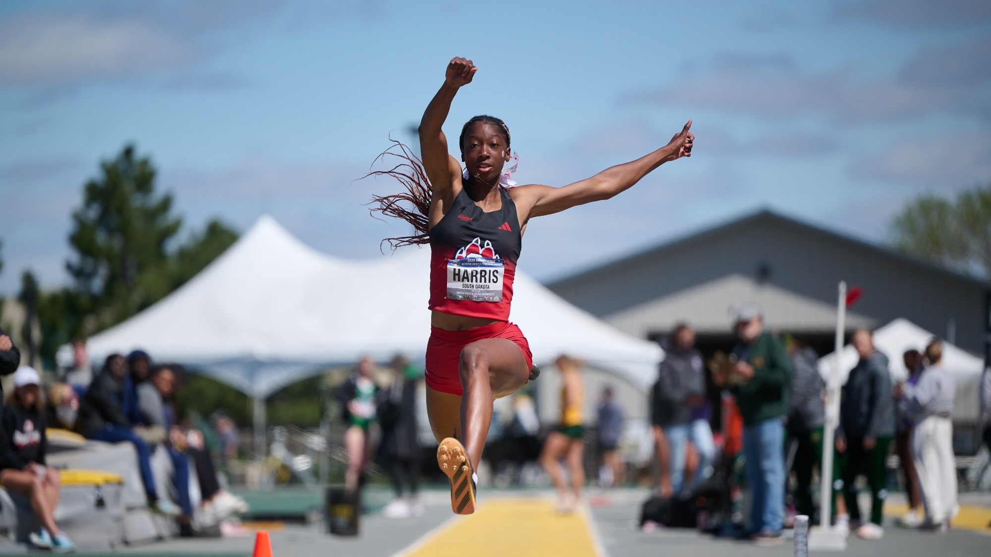 Kenya Harris competes in the triple jump at the Summit League Championships