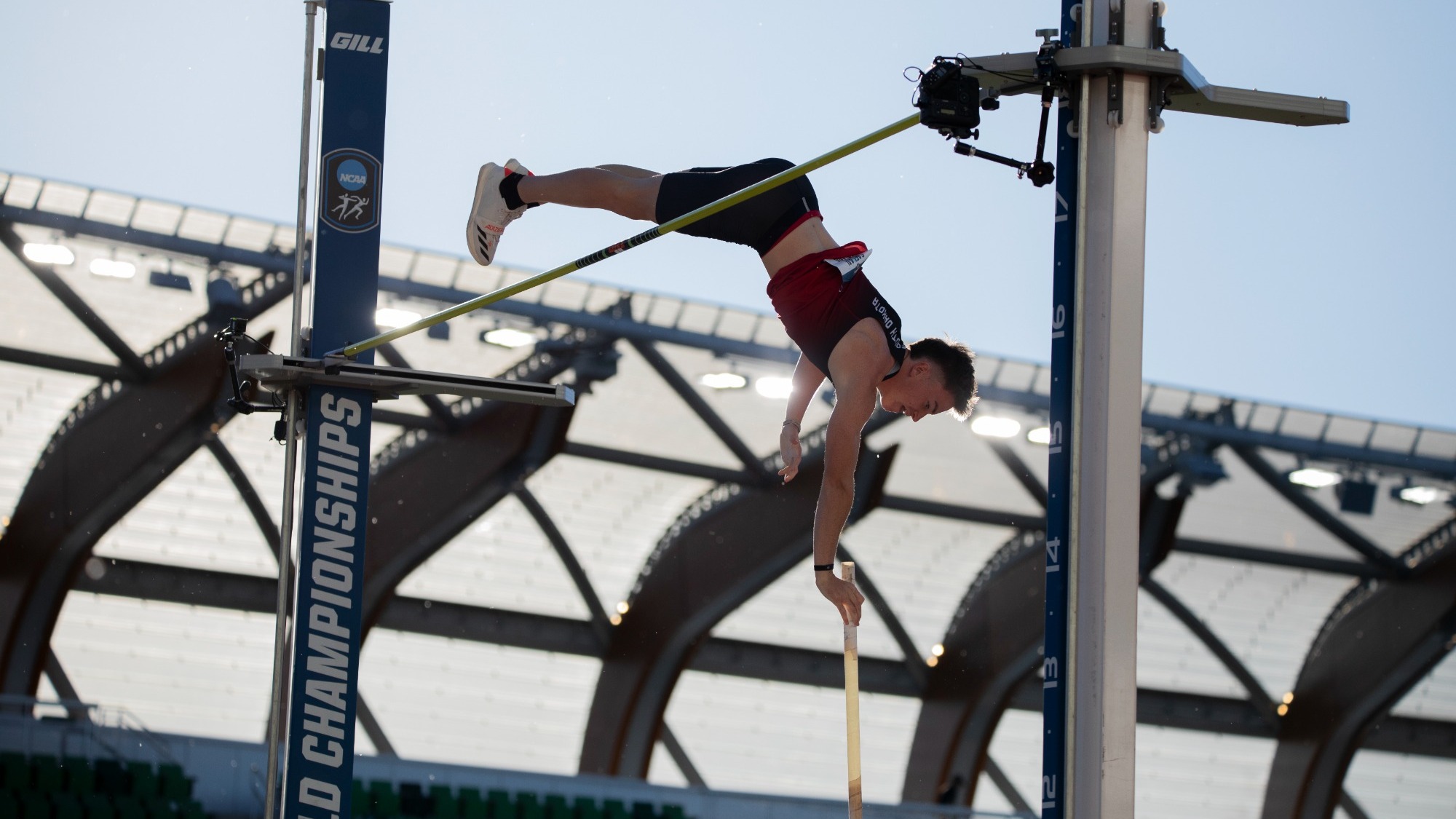 Caelan Harland competes in the pole vault at the NCAA Championships in Eugene