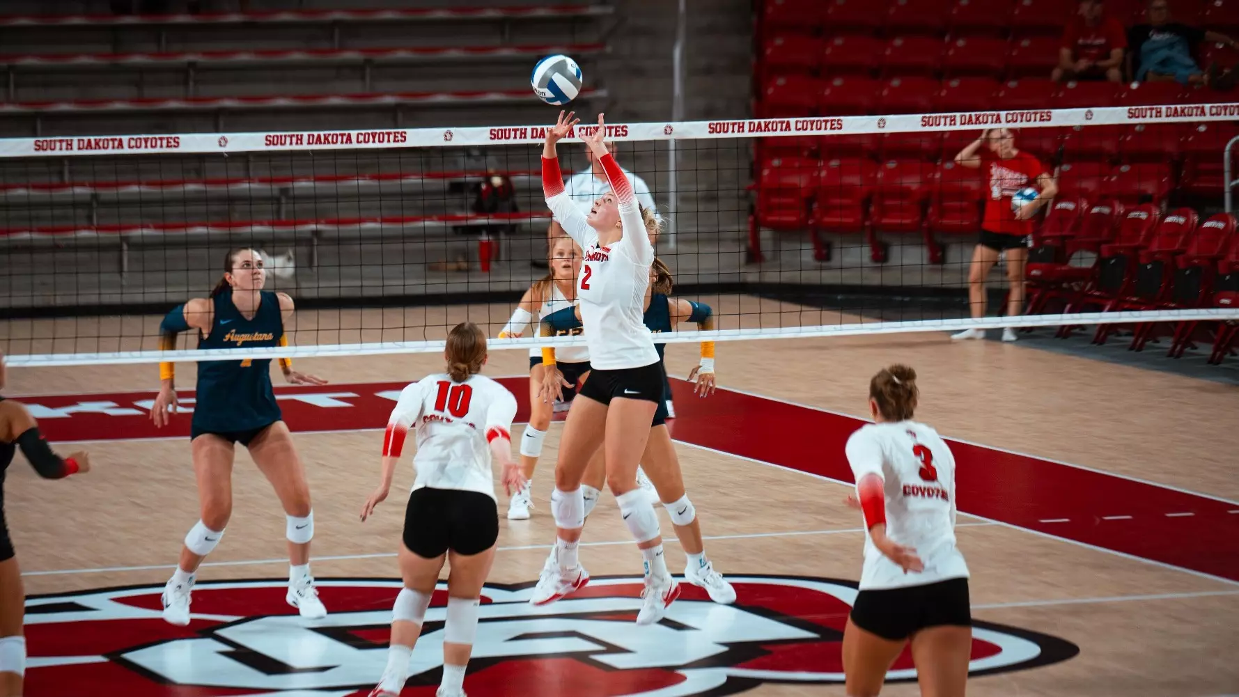 Avery Van Hook setting a ball against Augustana in an exhibition match 2026
