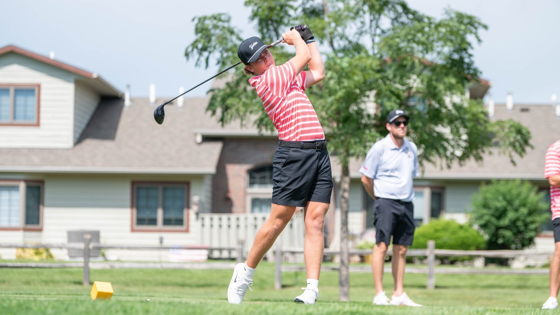 Jack Holtz teeing off from Hole No.1 at the Bluffs.