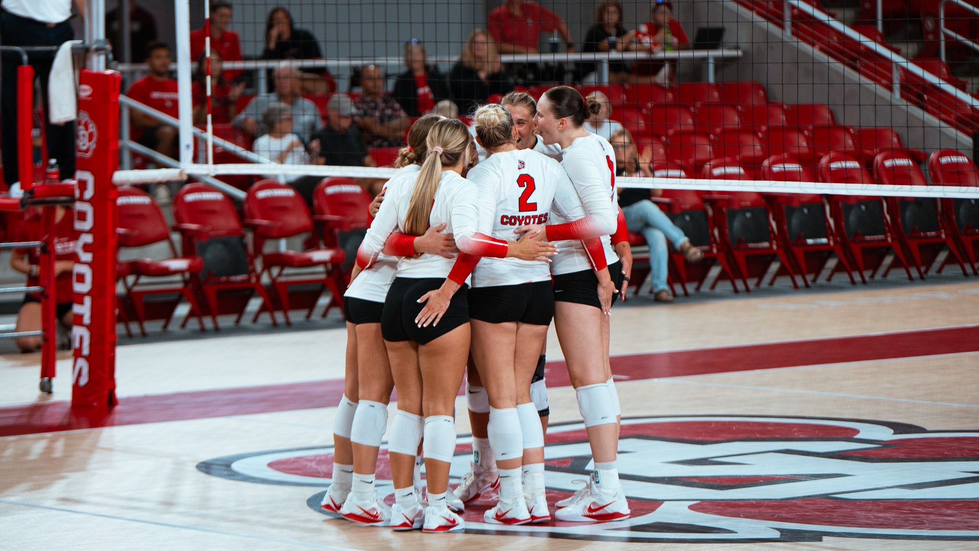 volleyball team huddle in an exhibition against Augustana 2026