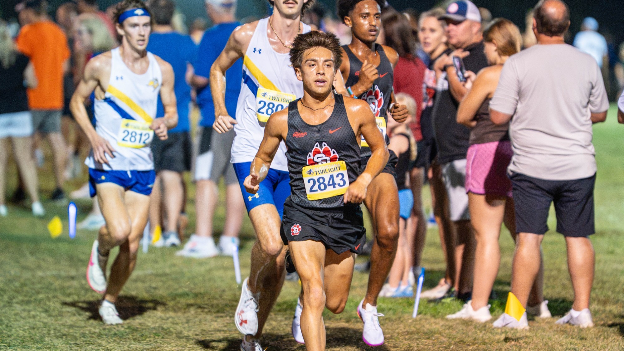 Isaac Ochoa leads the pack at the Augustana Twilight