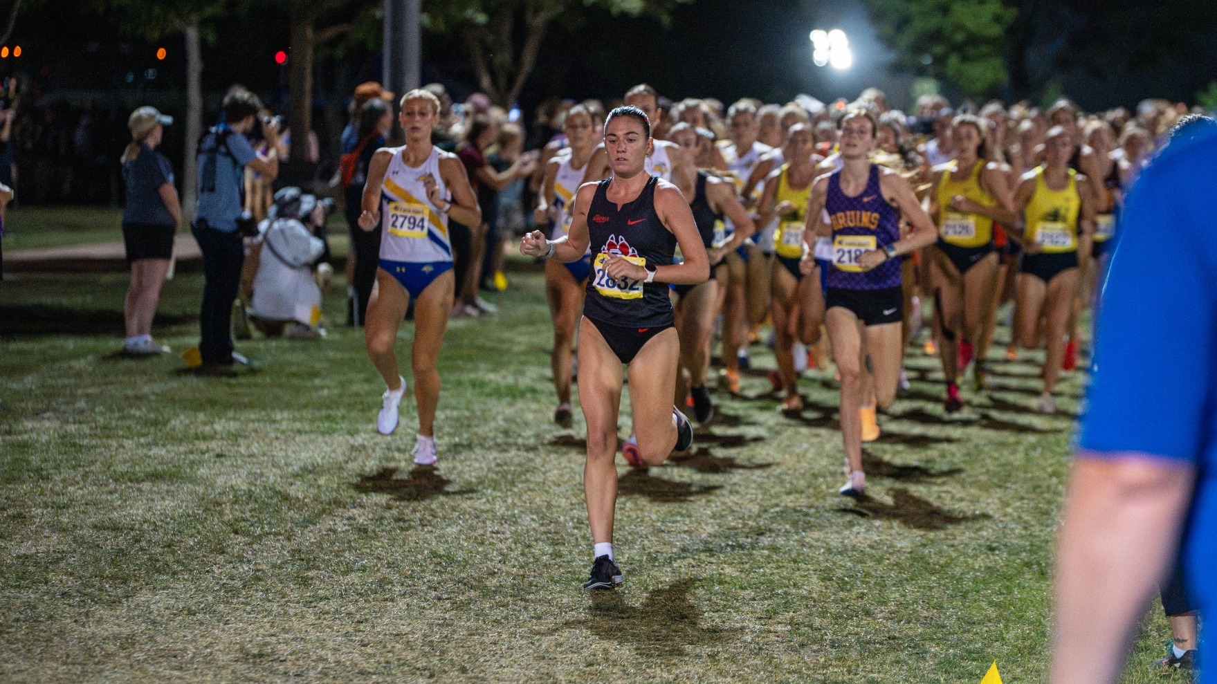 Geneva Timmerman leads the pack out of the start at the Augustana Twilight