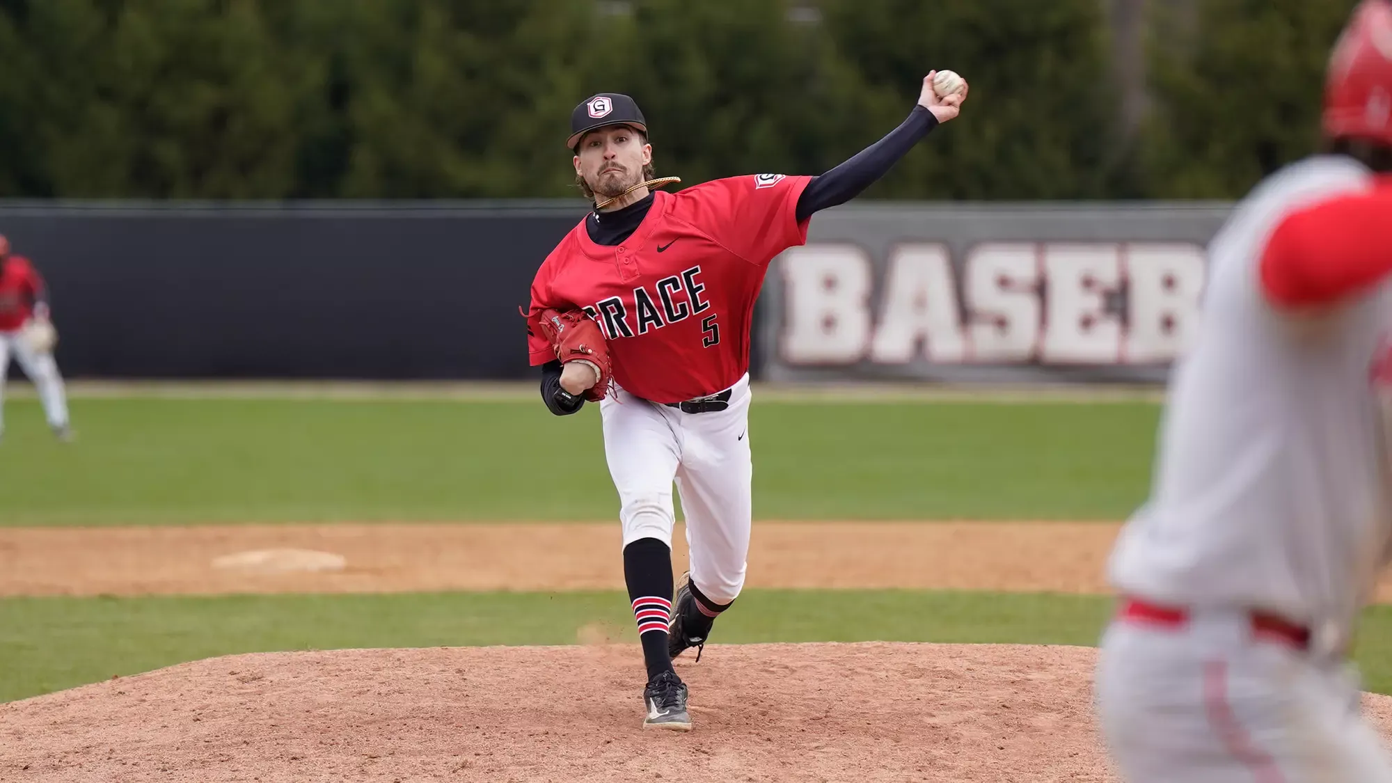 Parker Newby BASE pitch straight on just before release 2025