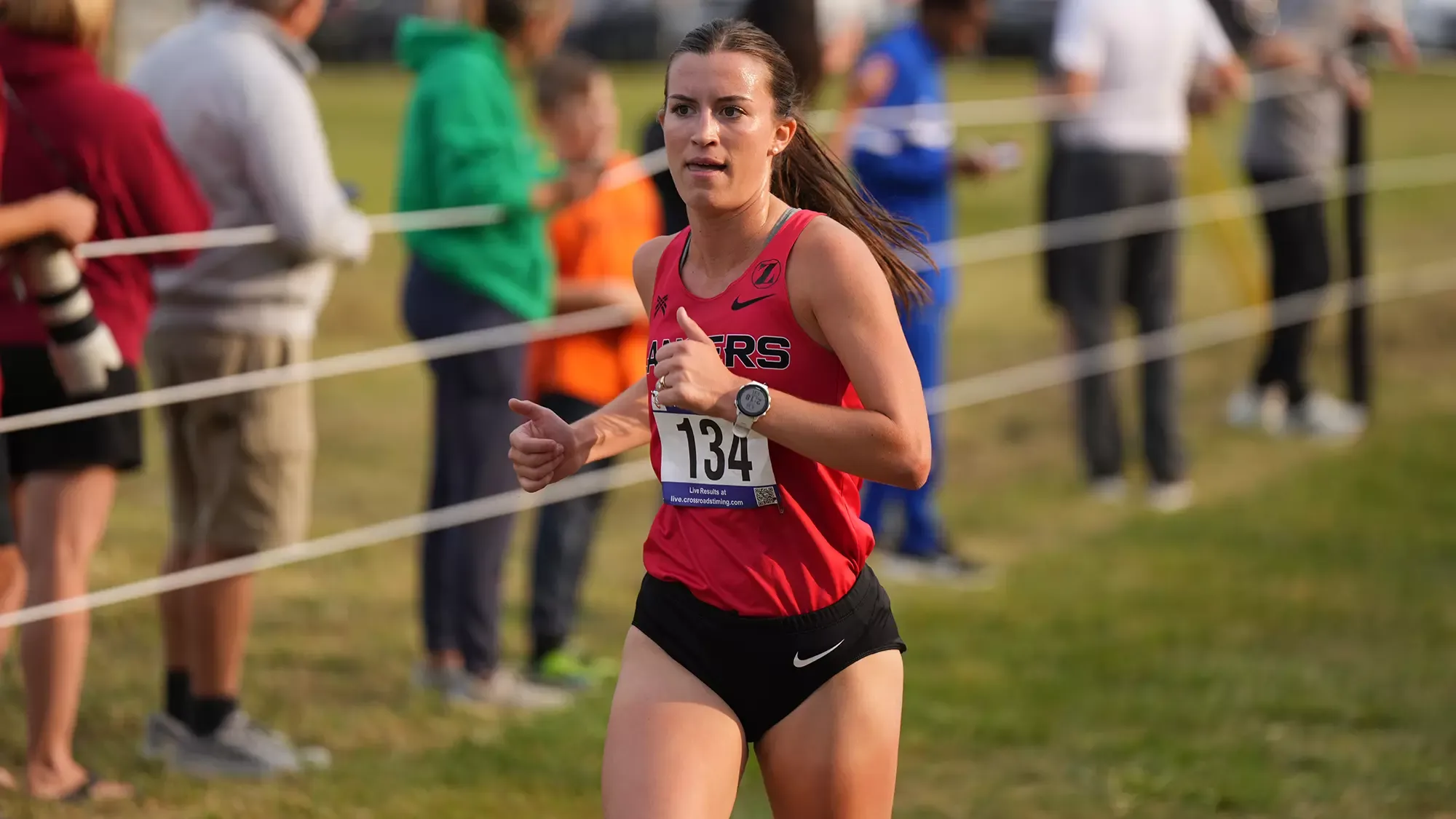 Esther Kleber red uniform XC solo 2025