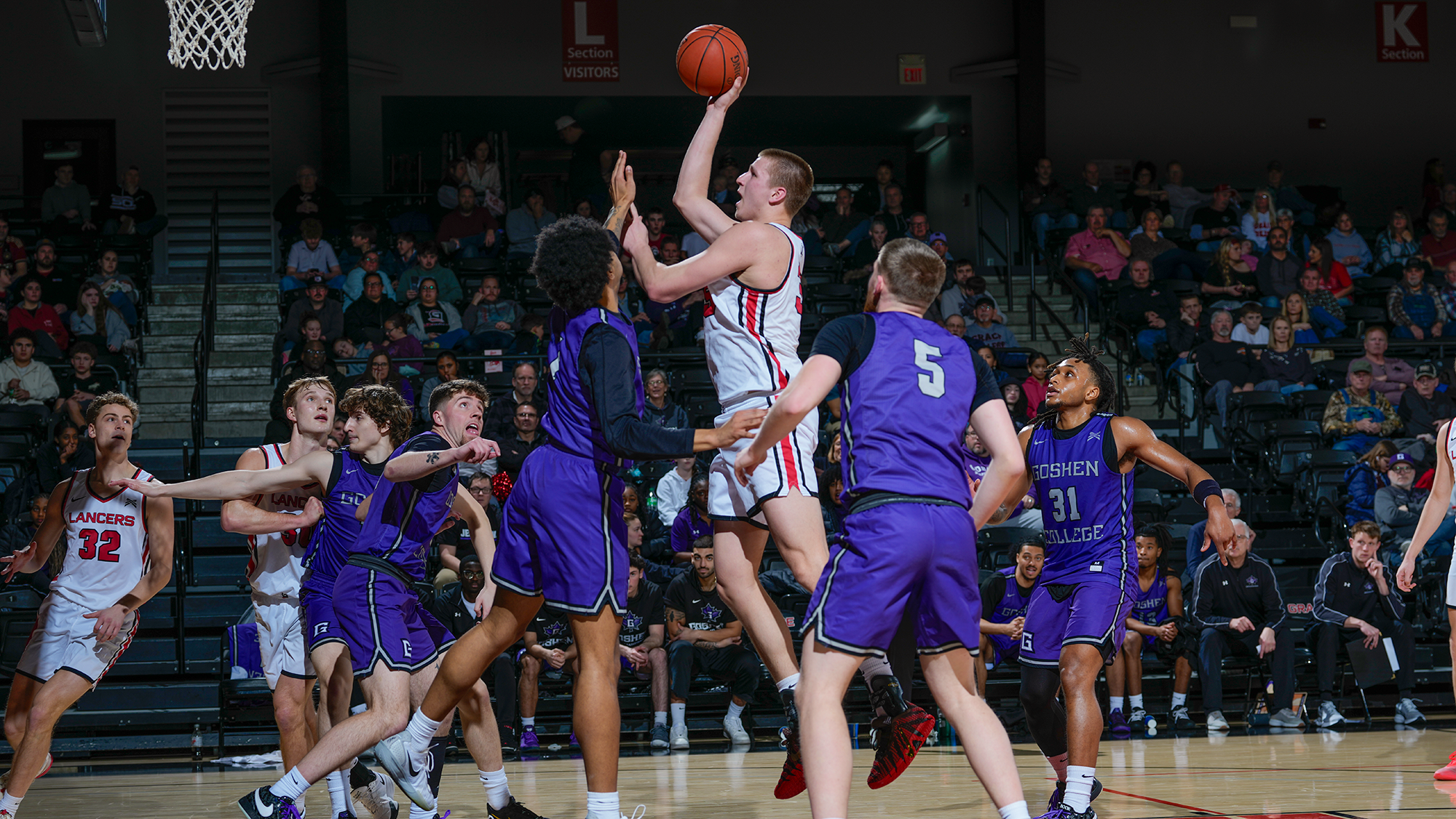 Tyler Raasch MBB rise post shot 2026