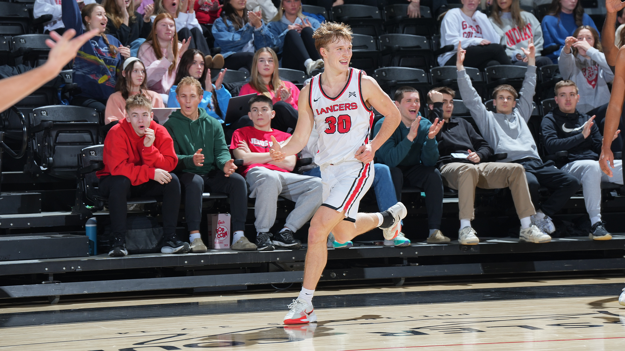Gage Sefton smiles 3pt MBB 2026