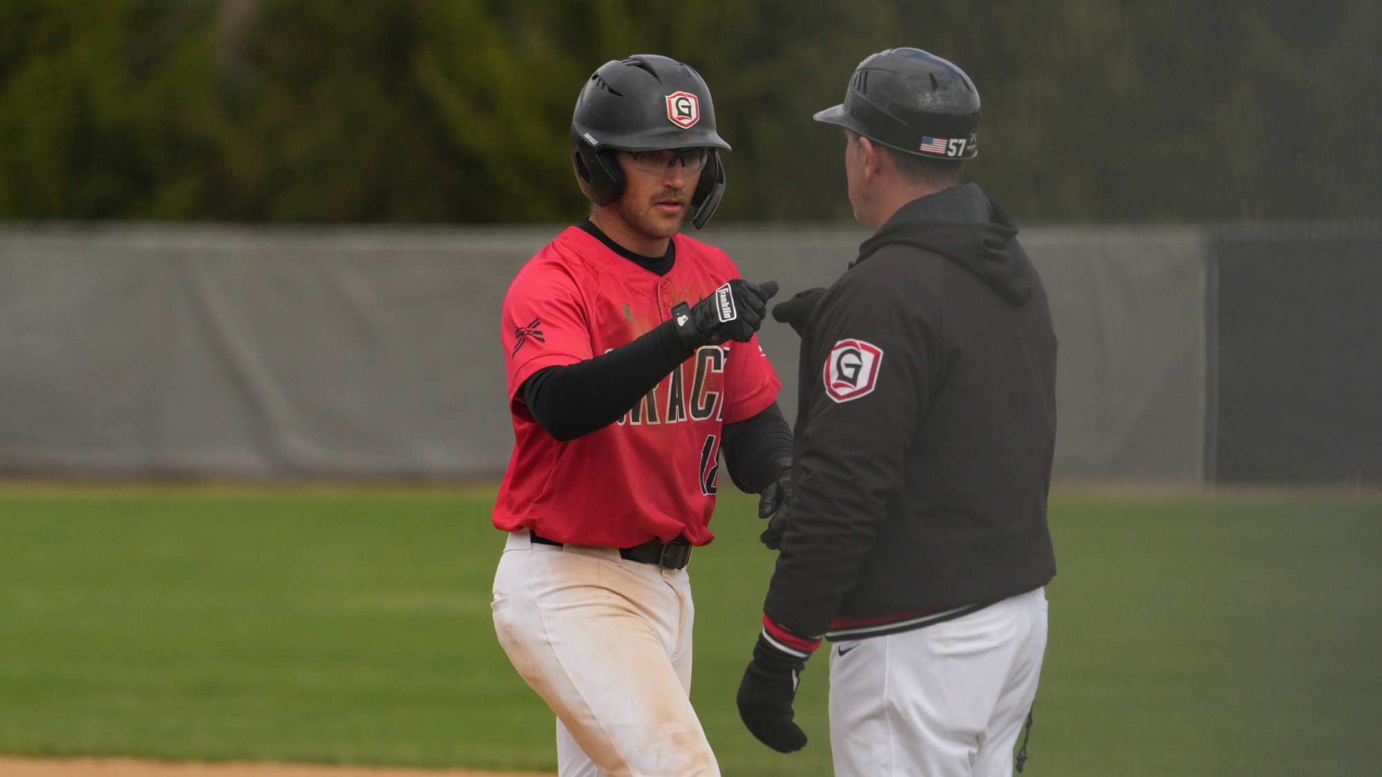 Matt Friesema BASE fist bump 2026