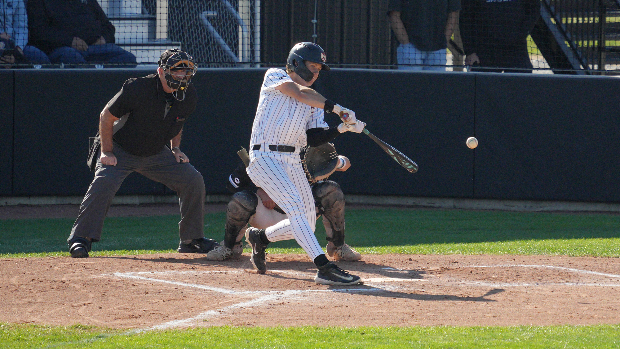 Darl Gustin swing from CF baseball 2026