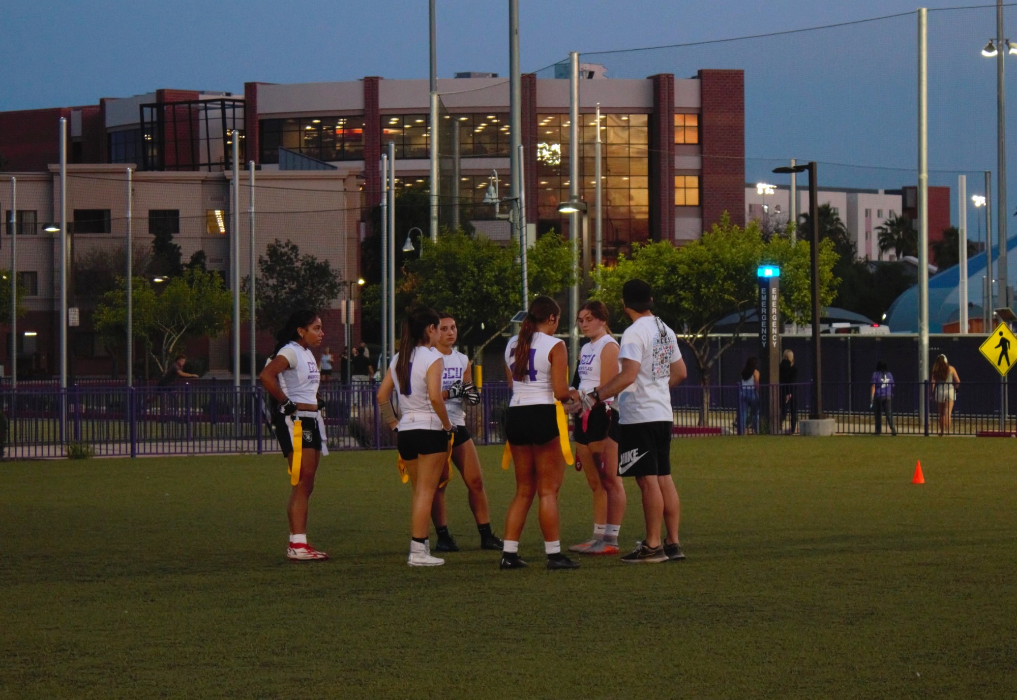 GCU WFLAG huddle in practice