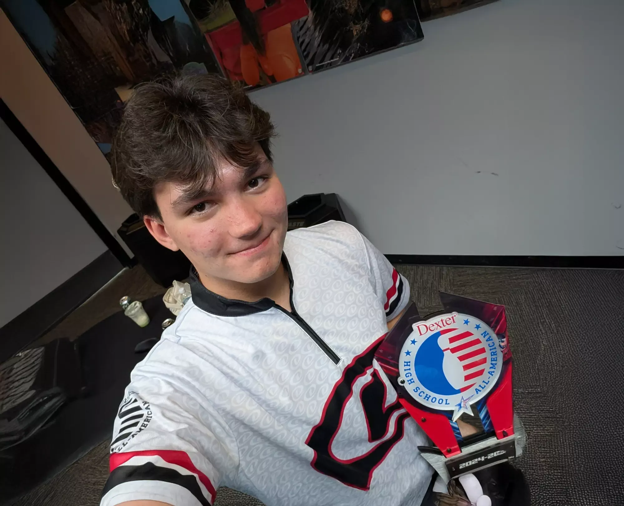 Jerrad Barczyszyn with Dexter All-American trophy
