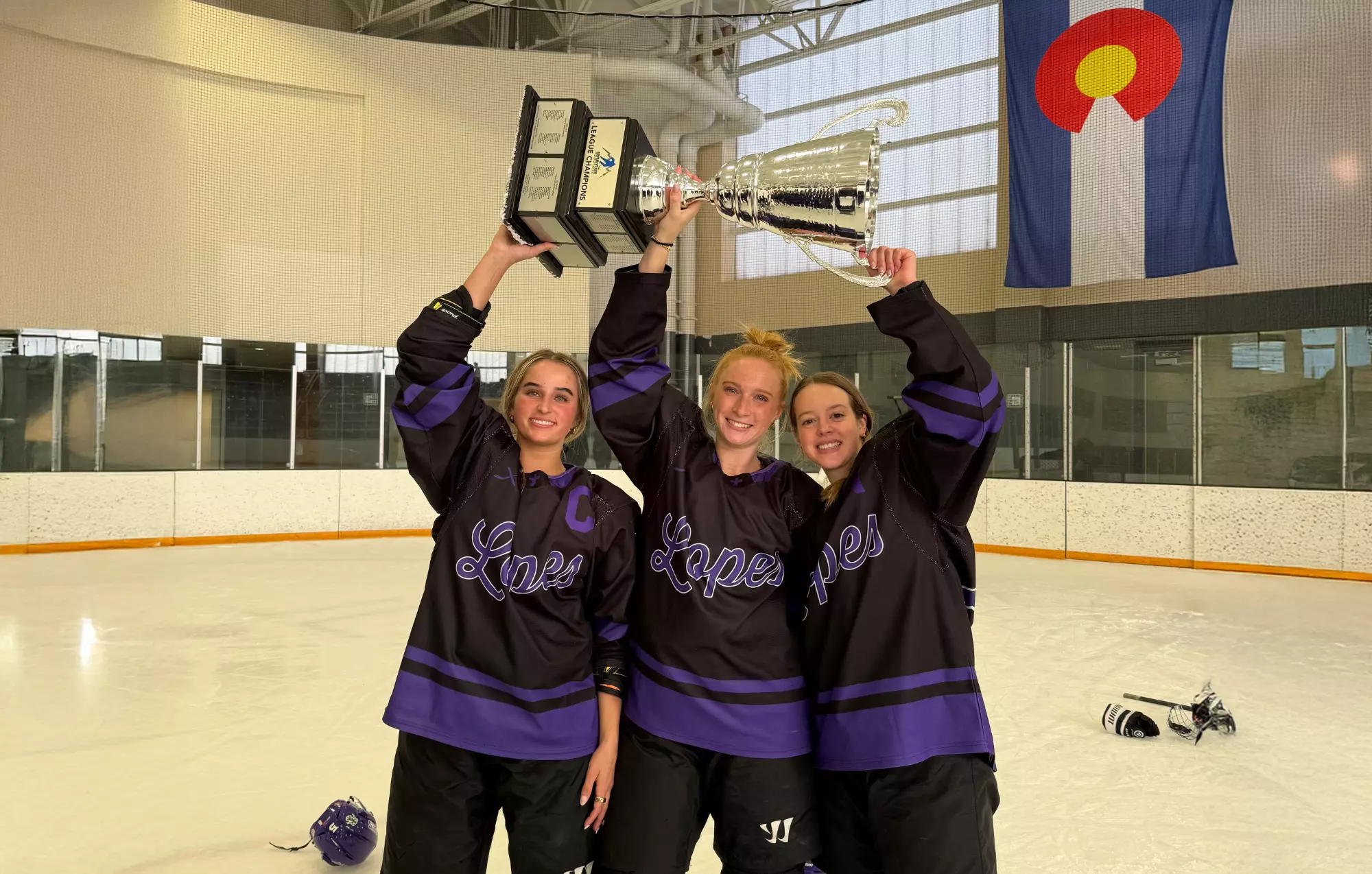 GCU Women's Hockey hoisting trophy 2-22-26