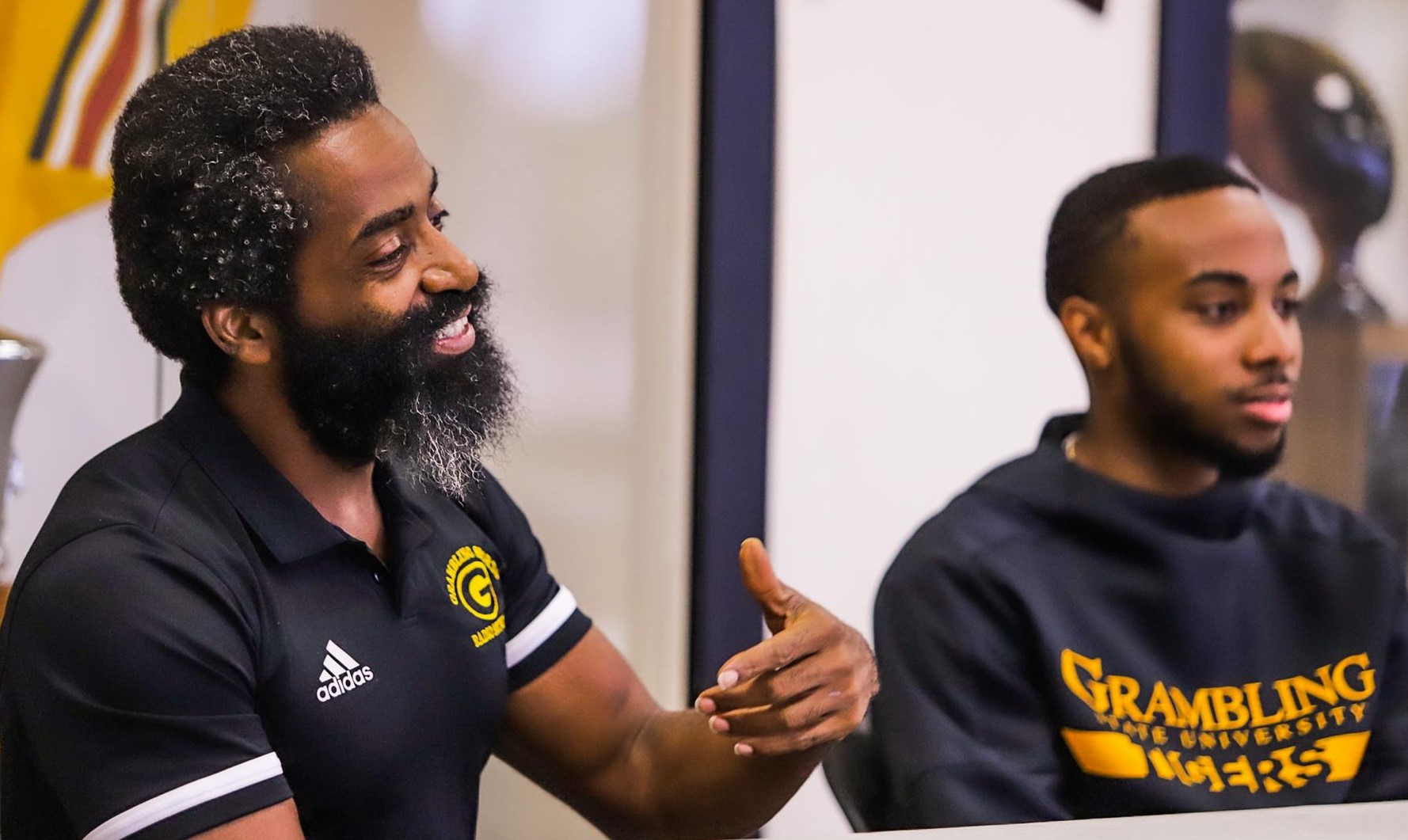 Leon Thomas III alongside Assistant Sports Information Director Evan Murry during an episode of “Rollin’ with the G” 