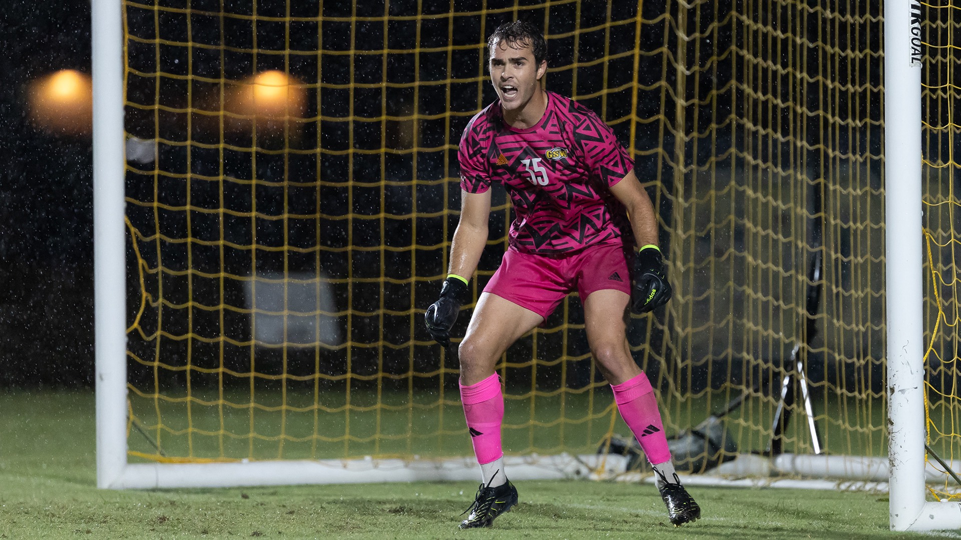 Goalkeeper Nathan Grady yells while awaiting shot