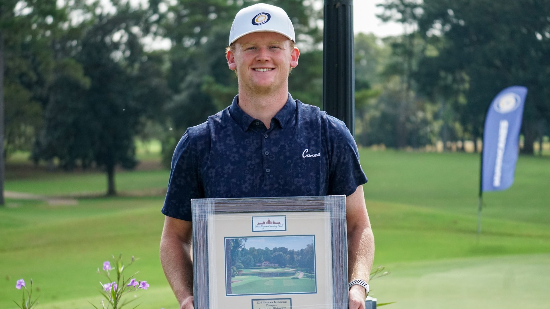 Jordan Jones with trophy from individual championship Hurricane Invitational