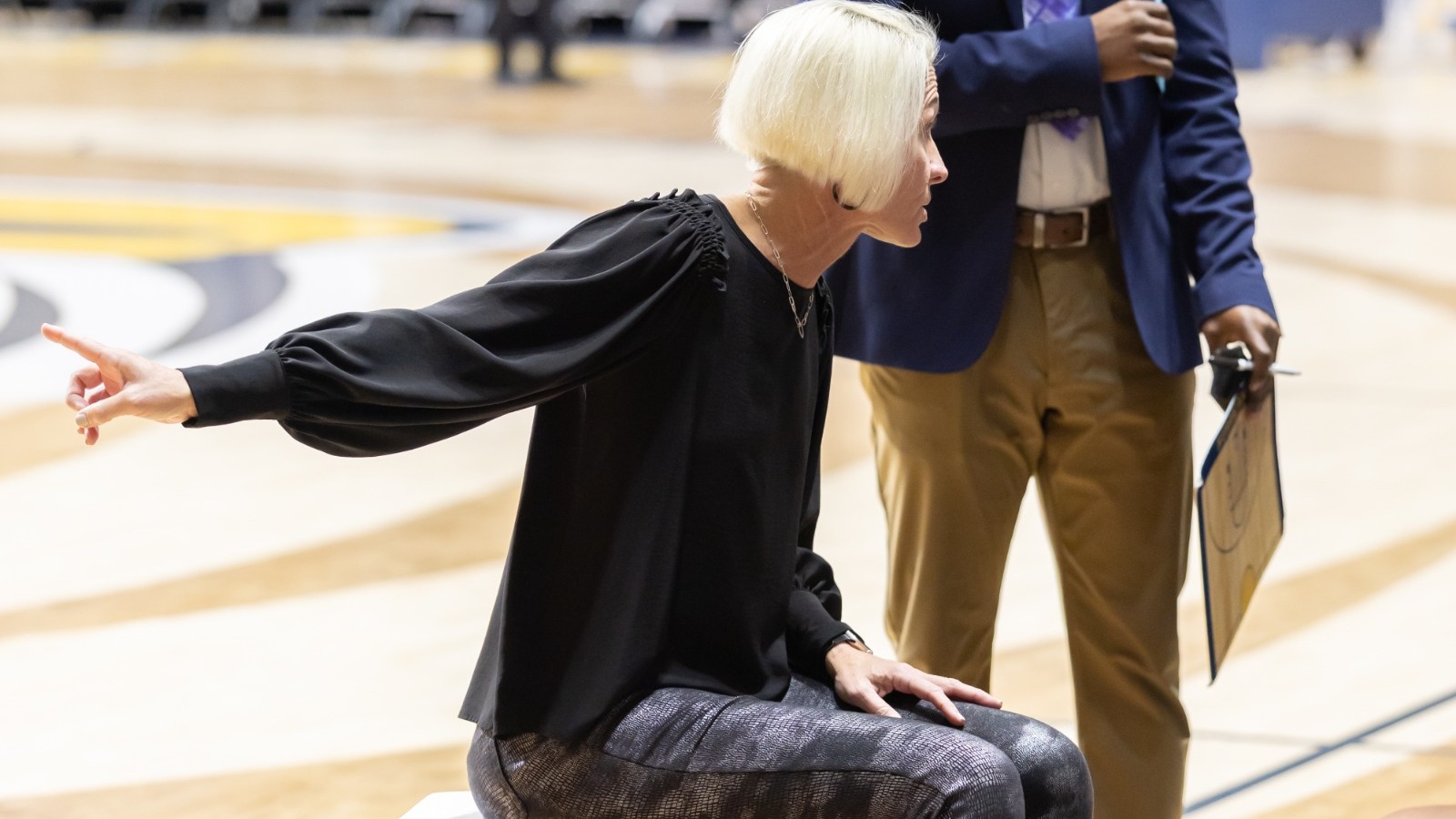 Tiber leading huddle against Georgia College