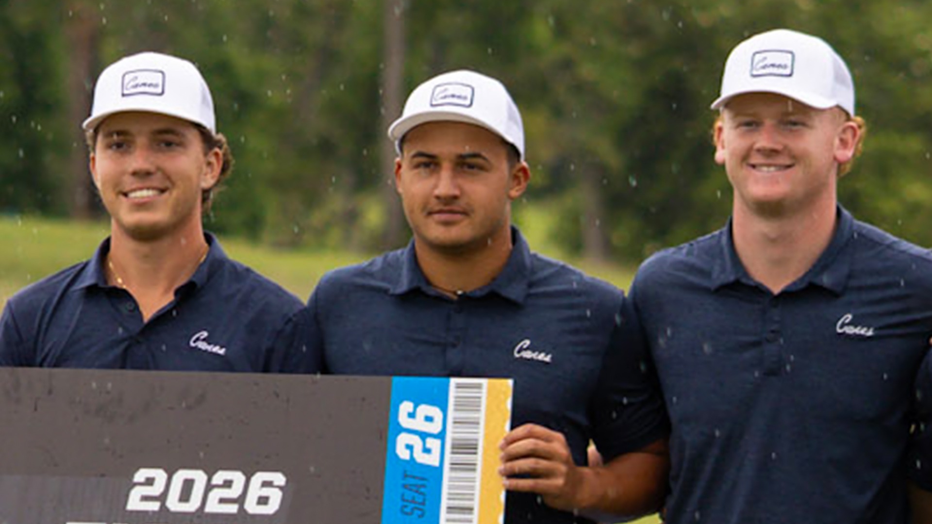 Brown Corlouer and Jones hold ticket punched sign for NCAA Championship