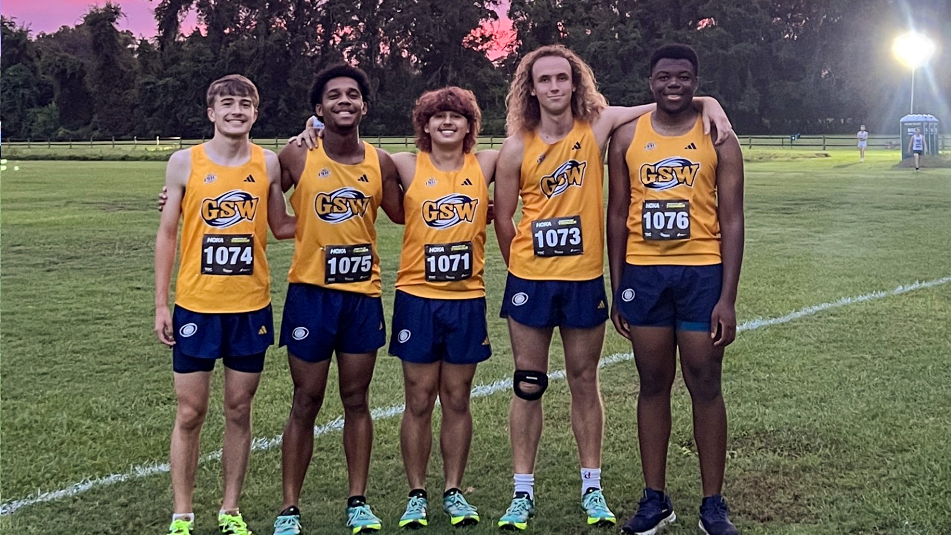 GSW Mens Cross Country Poses for Pic at HOKA