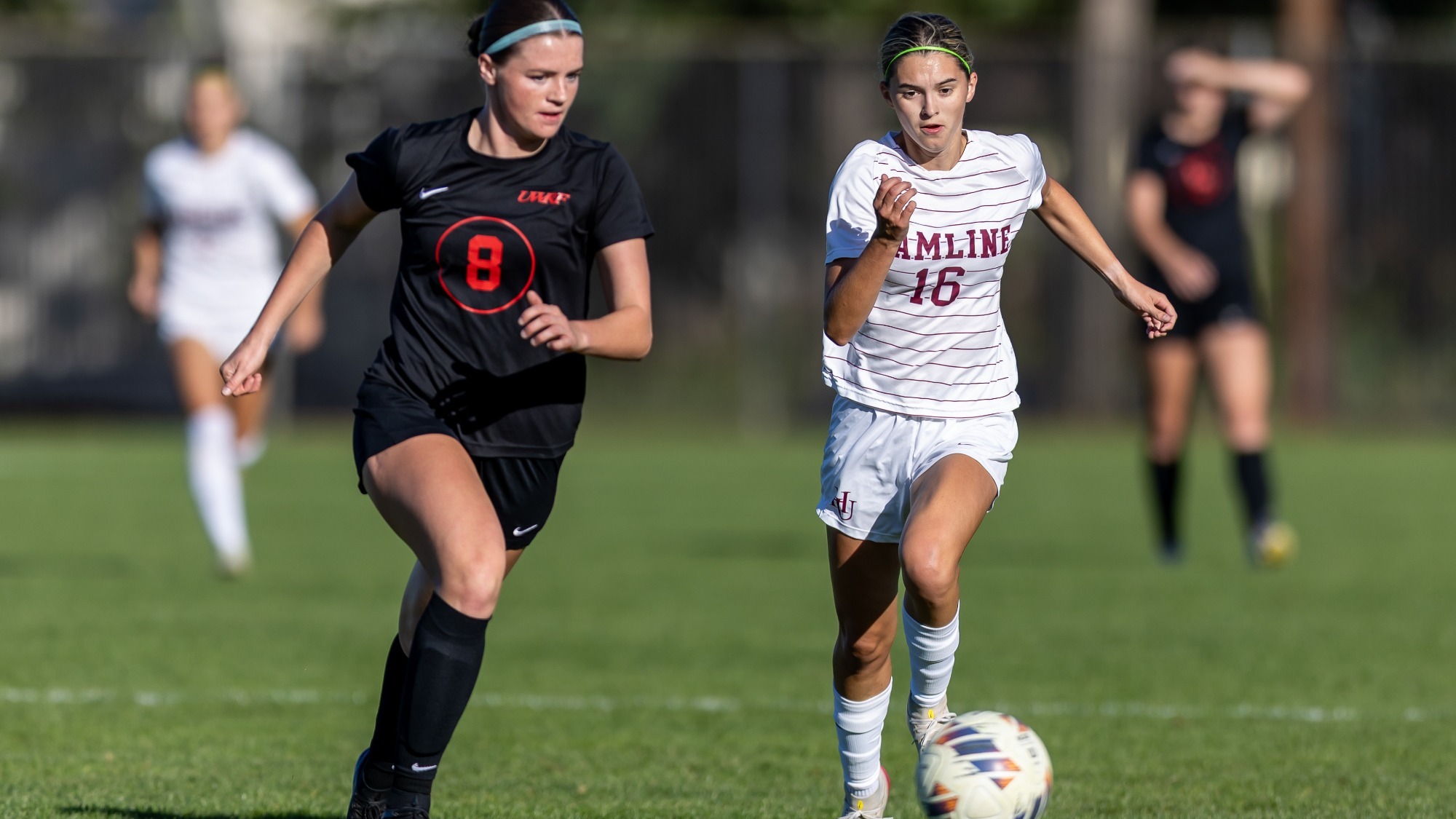 Avery Miller kicking the ball; womens soccer vs UWRF