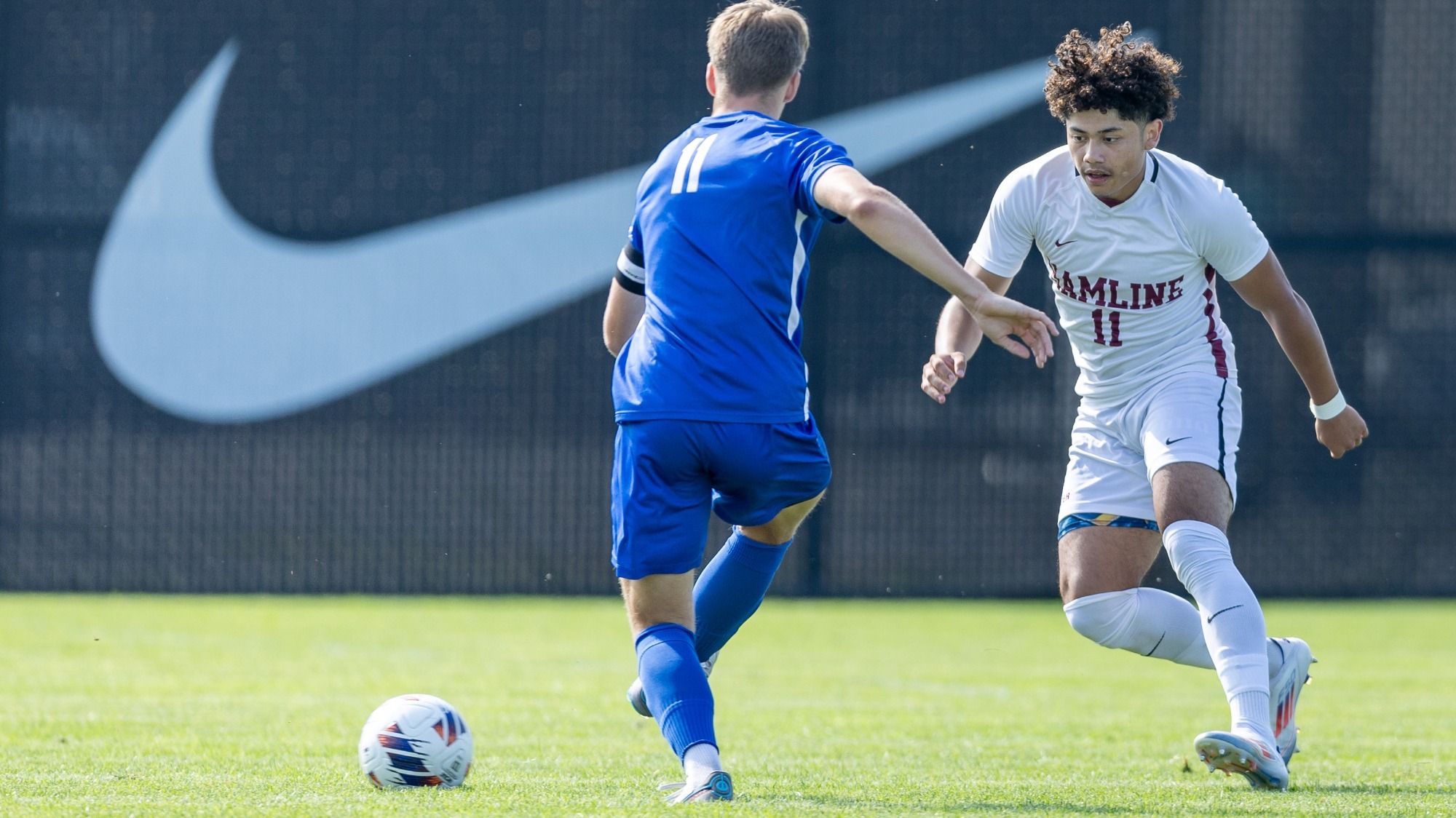 Cris Corrales going after the ball; Men's Soccer
