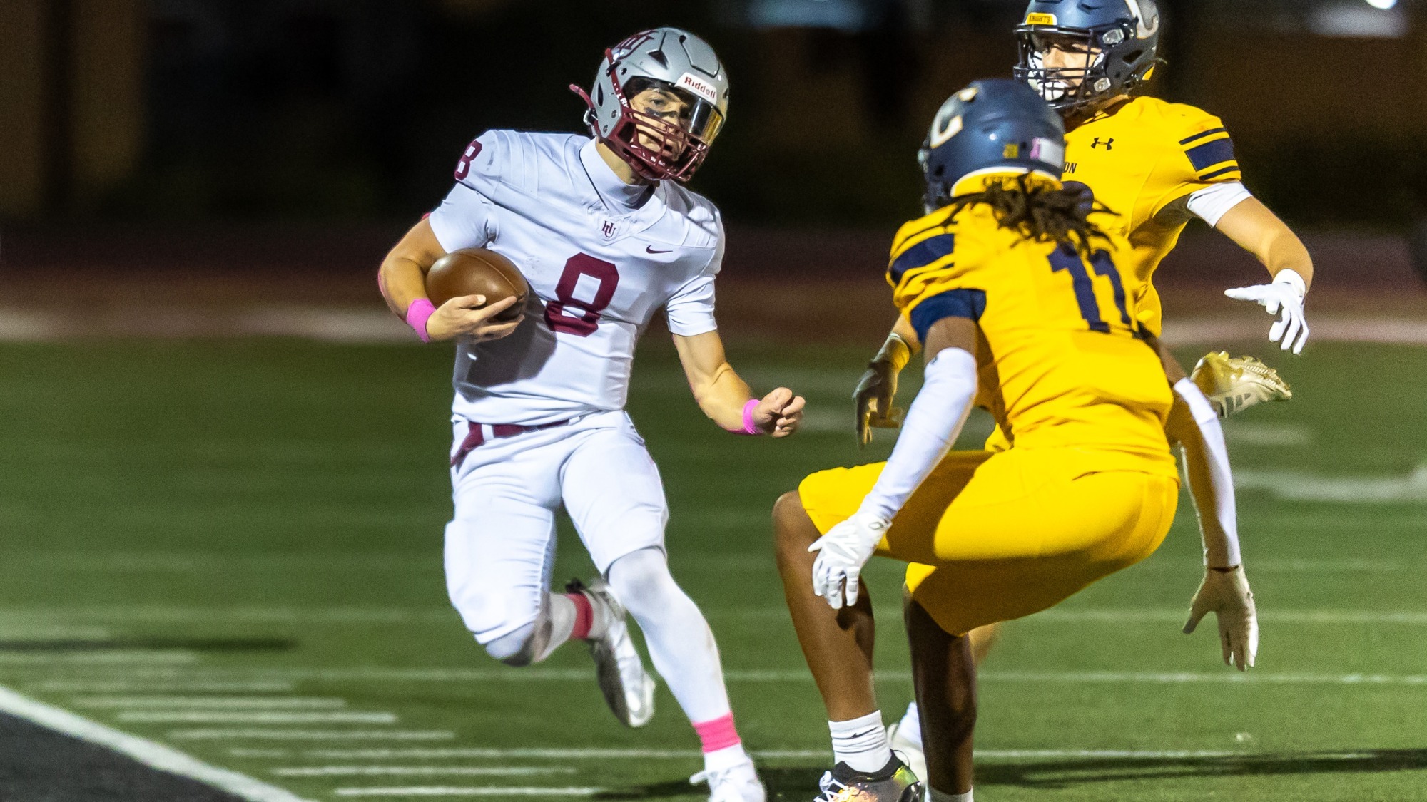 Daylen Cummings running the ball against Carleton
