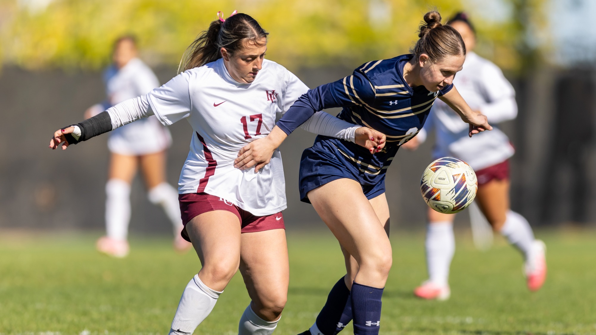 Graycie Griffiths battling for the ball against Bethel