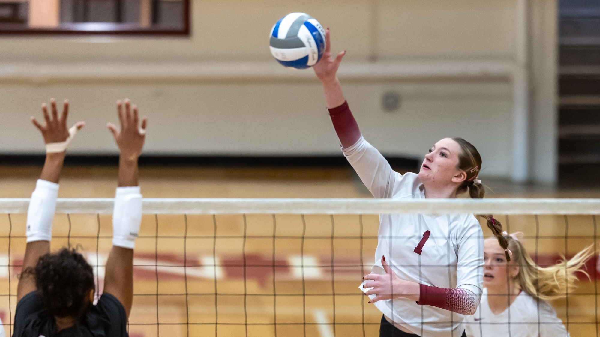 Sophia Johnson going up for a kill against Augsburg
